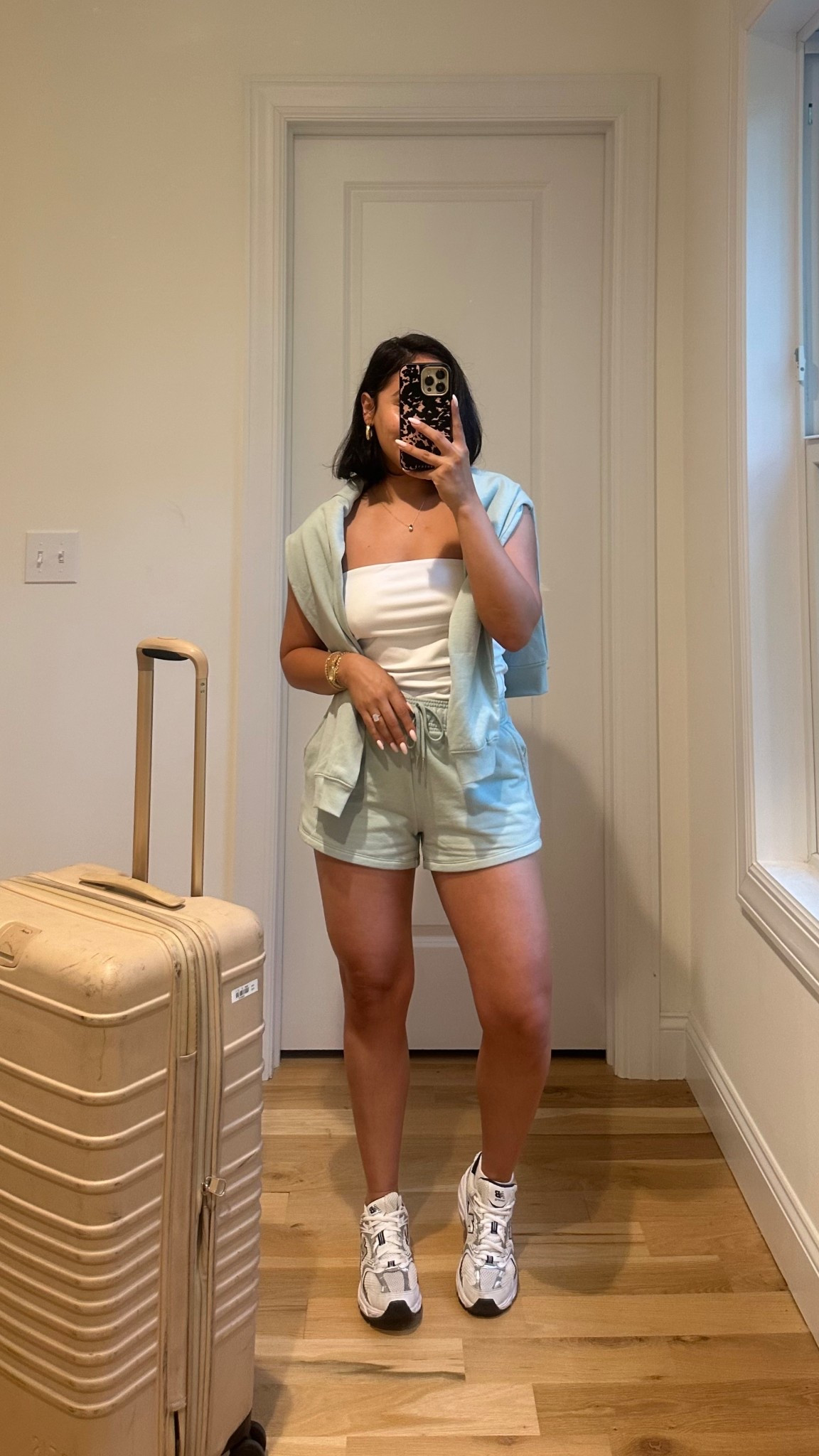 Airport fit 👟 wearing size Small in sweatshirt + shorts and Medium in tube top! 

#LTKTravel #LTKPetite #LTKFindsUnder50
