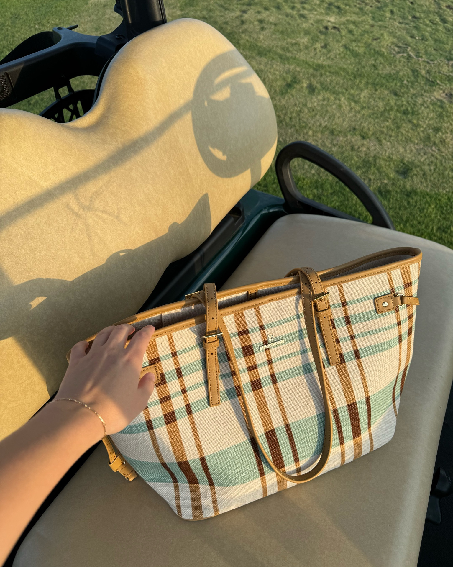 my favorite golf buddy ;) it’s the perfect little tote for fall! holds all the essentials!  

#LTKItBag #LTKSeasonal #LTKStyleTip