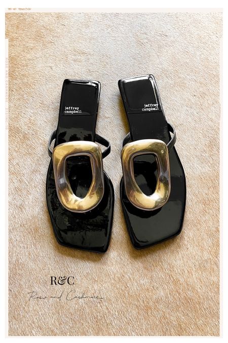black sandals with large gold hardware: chic and perfect for elevating any casual outfit this Spring season
#spring #sandals #summer #Easter 

#LTKshoecrush #LTKSeasonal #LTKFind