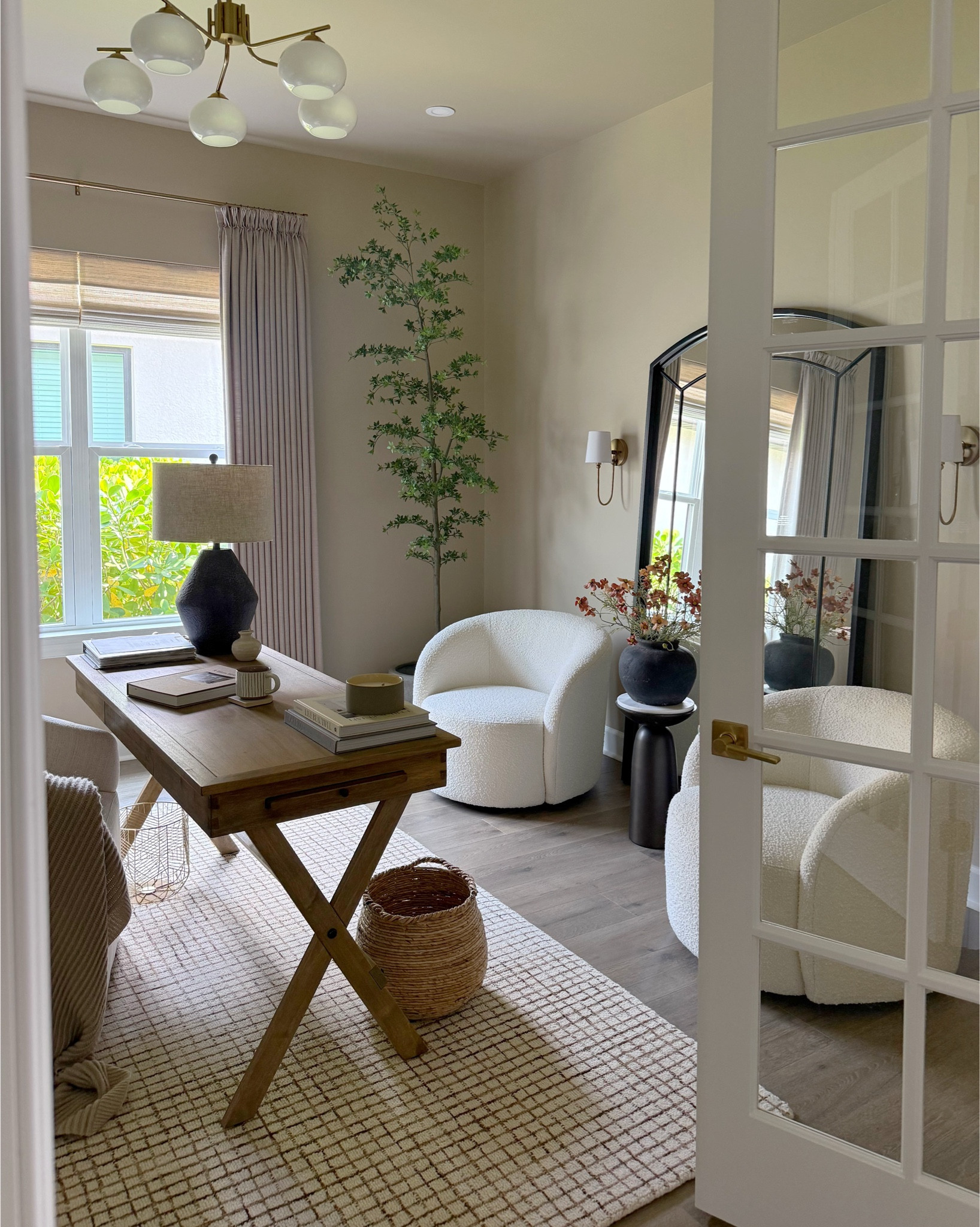 Saturday office views 🤎

Curtain details:
Liz Linen
Burlywood Birch
Triple Pleat
75W x 104L
Room darkening
Memory shaped


#homeoffice #officedecor #homedecor #arearug #checkeredrug #olivetree #shadylady #planter #floormirror #blackmirror #wallsconce #bouclechair #accentchair #officedesk #officechair #customcurtains #twopages 

#LTKHome