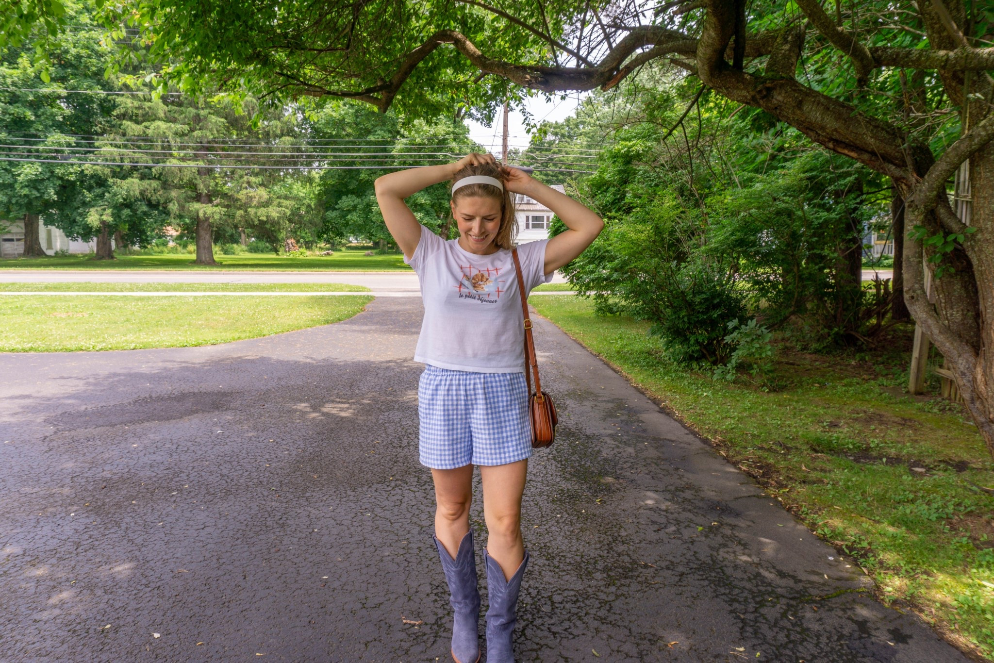 Cowboy boots, graphic tee, white headband, summer fashion, spring fashion 

#LTKSeasonal #LTKShoeCrush