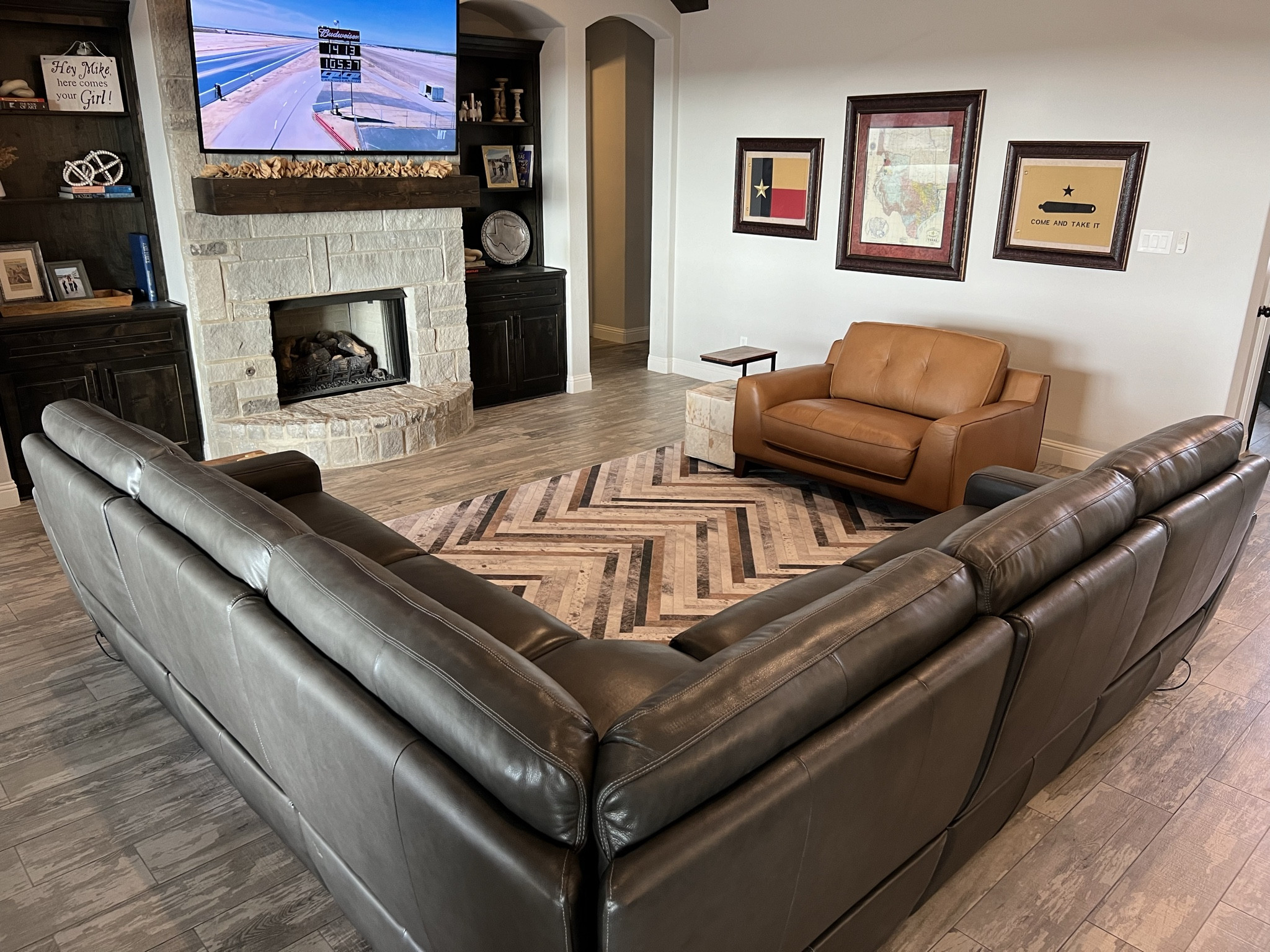 Love our living room makeover! This washable 9x12 faux cowhide rug is amazing, and it’s under $200! The rug pad is definitely needed, and it makes it super comfy! This gray leather power reclining sectional is insanely comfortable and on SALE. Finding the right furniture was a labor of love, but it was so worth it!

#LTKhome #LTKMostLoved #LTKsalealert