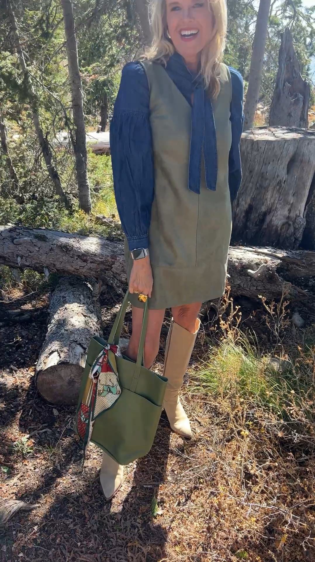 Fall outfit/ fall fashion
Trending fall color green and trending suede

Faux suede Dress loft and fits tts I am in a small hits at knee comes in two colorss Long Scarf

Chambray  top with neck  tie
And slightly balloon sleeve

Tall suede boots by dolce vita (old) linked this years version tts

Able Lester  tote with 2 exterior pockets  1 interior pocket  perfect Tote for fall in a beautiful green comes in 3 colors 

Long Scarf  in perfect fall colors with a horse theme very designer feeling

Budha girl bracelets 

Lisi lurched gold beaded bracelet 

#LTKVideo #LTKItBag #LTKStyleTip