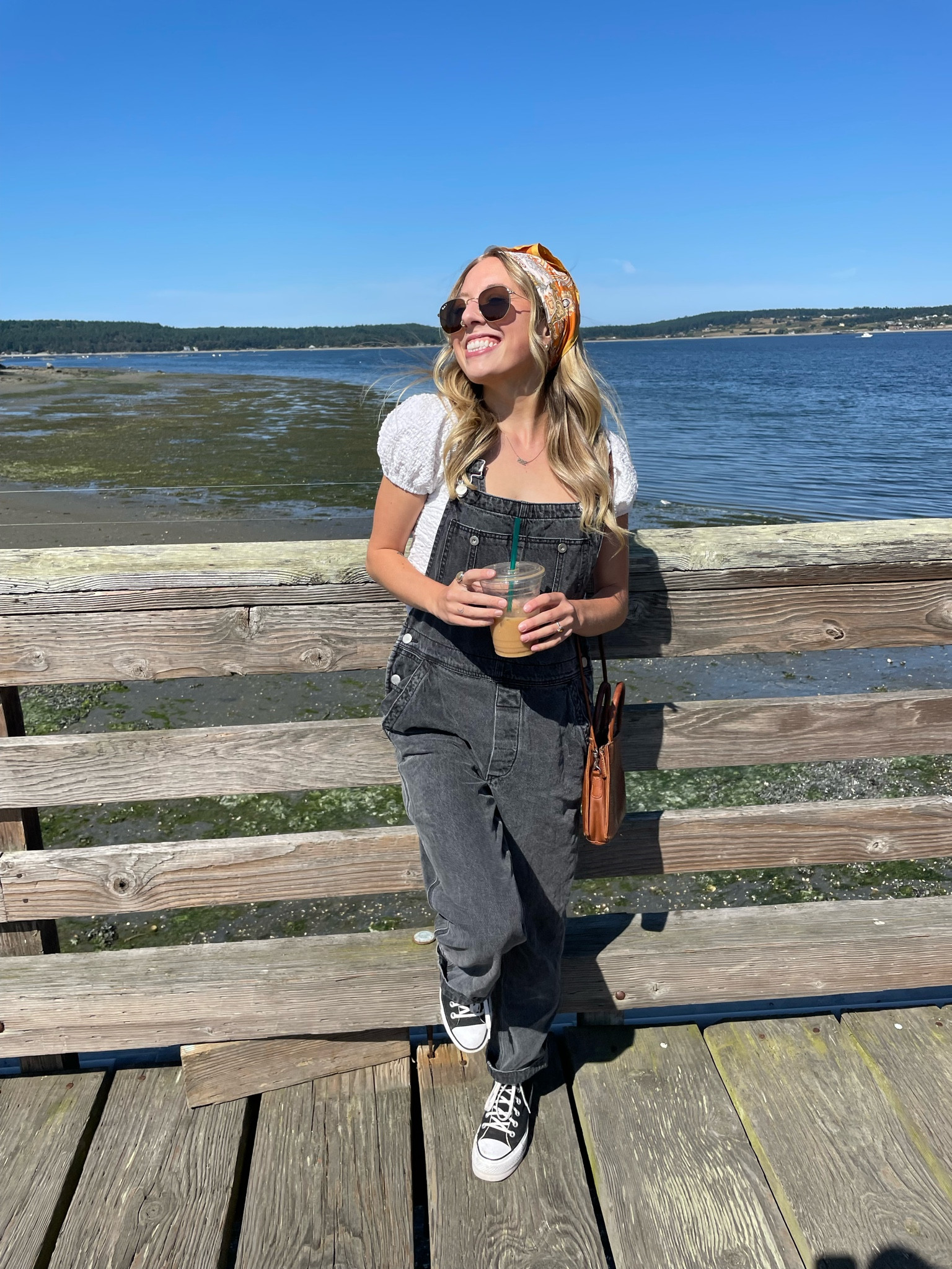 A day at the beach, an iced coffee AND a cute fit??? Dream day 🌞 These free people overalls have been a staple in my closet for 3 years now (I also have them in light pink which is so so cute). 

#LTKSeasonal #LTKSummerSales #LTKFindsUnder100