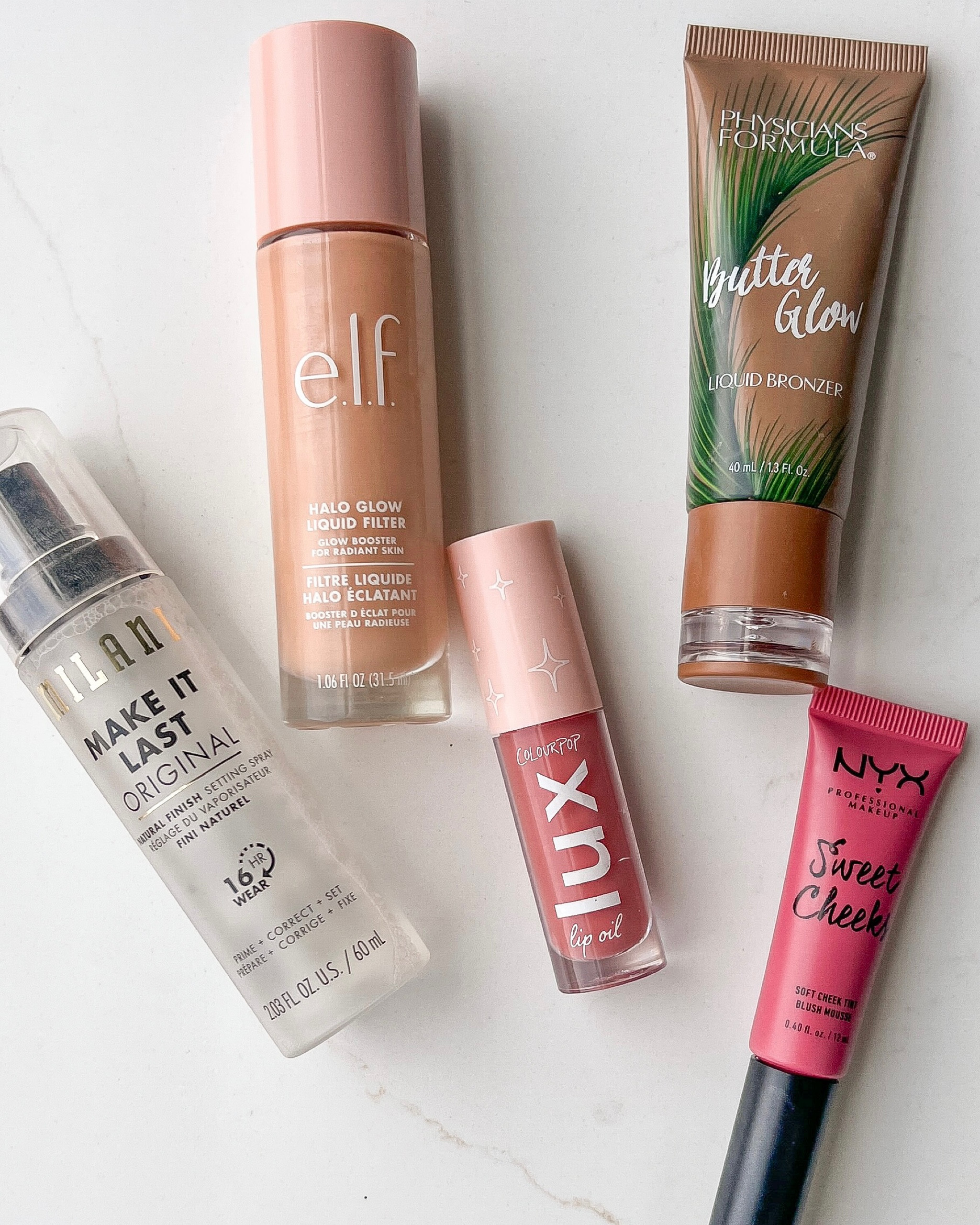 Drugstore summer makeup must-haves 

Shades
Bronzer - bronzer
Elf liquid filter - 3
Blush - baby doll
Lip oil - bengal 

#LTKstyletip #LTKFind #LTKbeauty