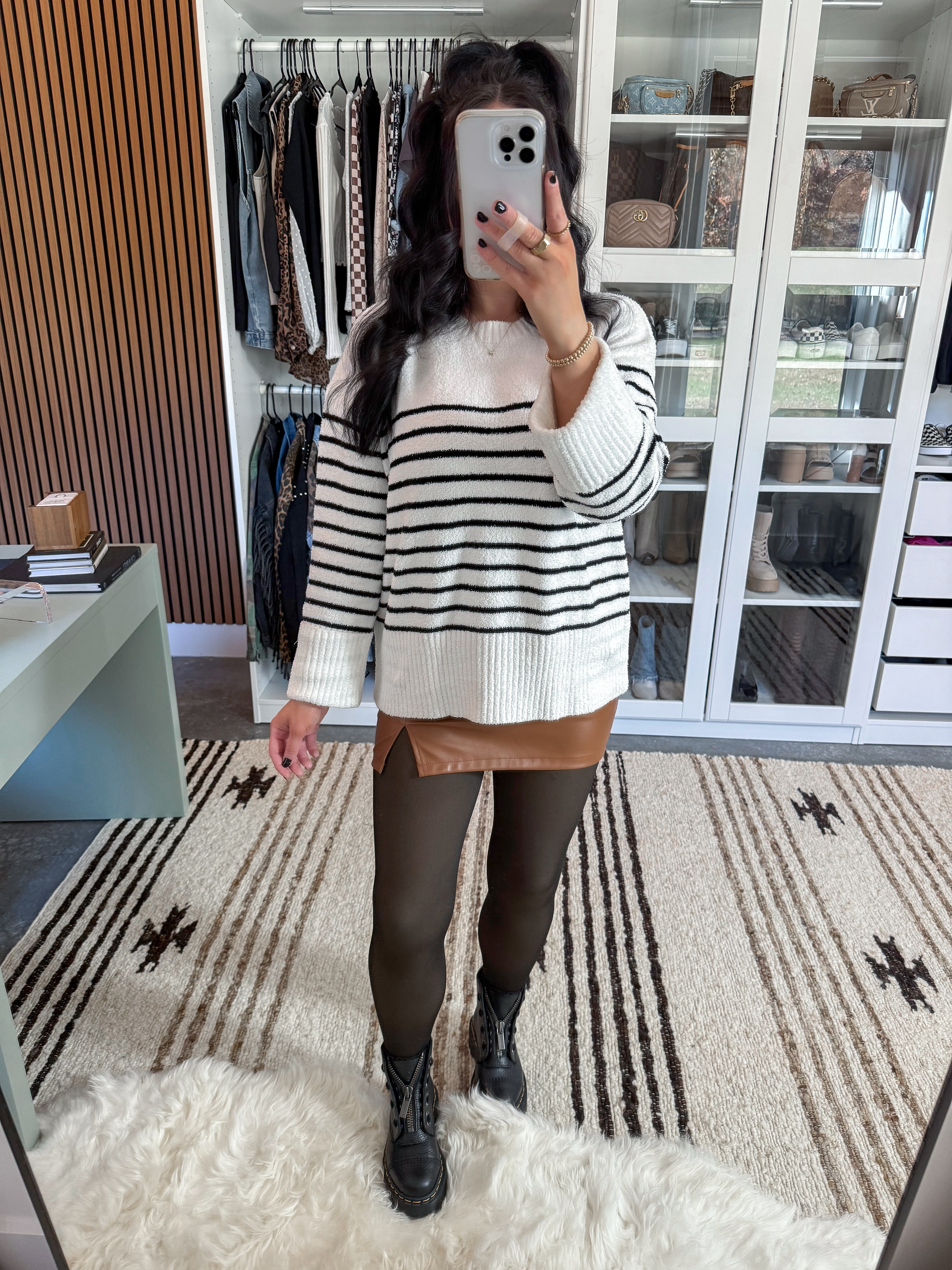Winter OOTD 🖤

Sweater - small
Skort - small
Tights - small/medium (thin fleece option)

Love the fit combo of this outfit with the oversized, loose sweater paired with this fitted mini skort! This striped sweater truly feels like a blanket! Paired it with this tan faux leather skort, some fleece lined tights (you NEED this for the winter!) & my platform docs! 🖤

 

 #LTKootd #LTKSaleAlert #LTKFindsUnder100
