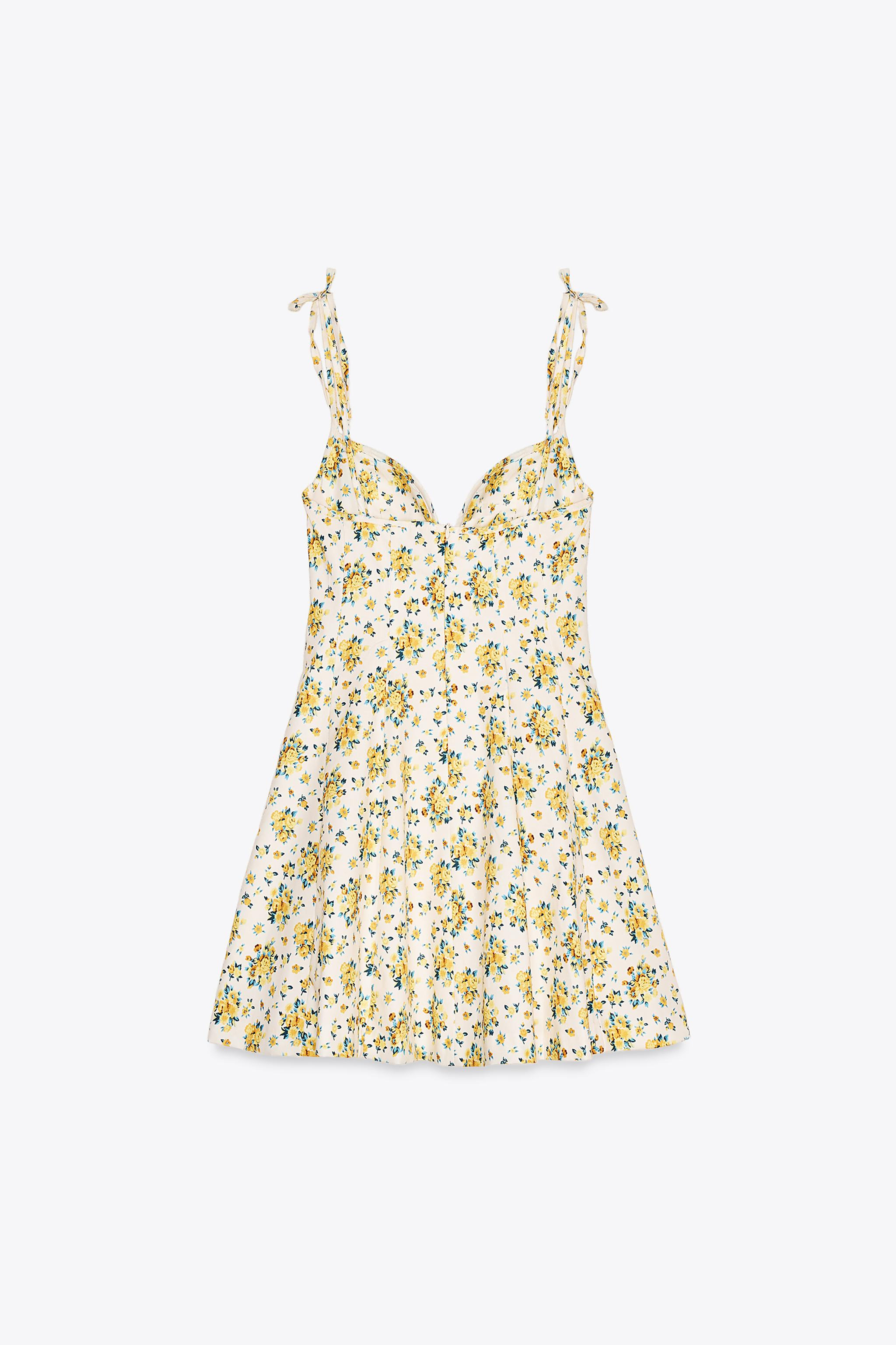 Short sweetheart neckline dress with adjustable tie spaghetti straps. Matching inner lining. Hidd... | Zara US