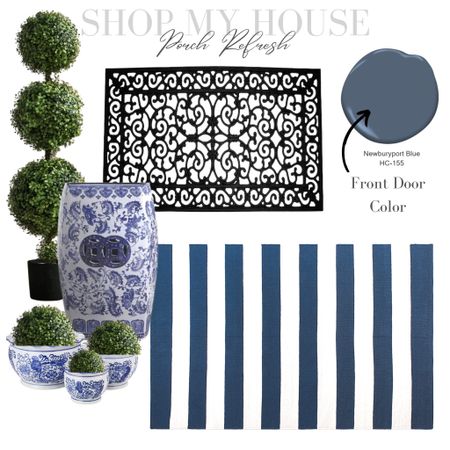 Front Porch Refresh using blue and white striped outdoor rug, chinoiserie planters, chinoiserie garden stool, faux boxwood topiary, black rubber door mat #porch #decorating #interiordesign #homedecor

#LTKhome #LTKstyletip #LTKsalealert