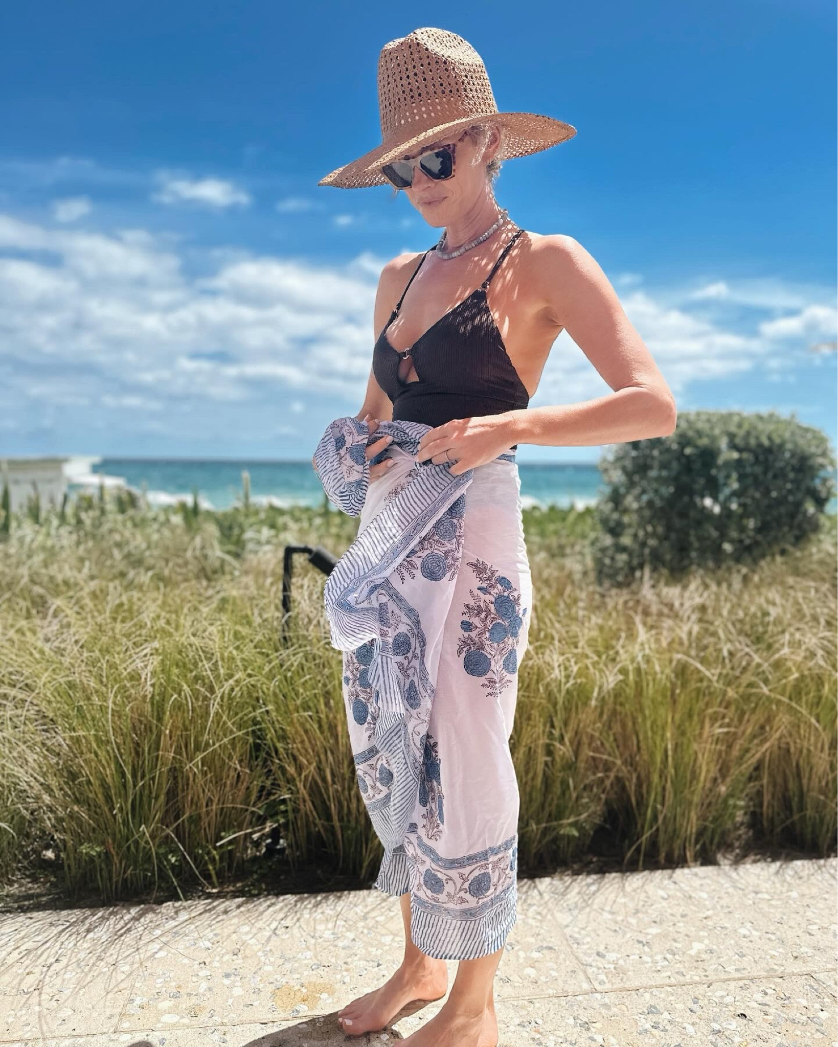 The medium LONG aerie suit 🤎 love it so much and it was so fun to wear. Amazon sarong. Also - this hat with the perforated holes never once flew off my head on a windy beach day!  I kept telling my family how excited I was 🤍 size medium. 

#LTKfindsunder100 #LTKstyletip #LTKtravel