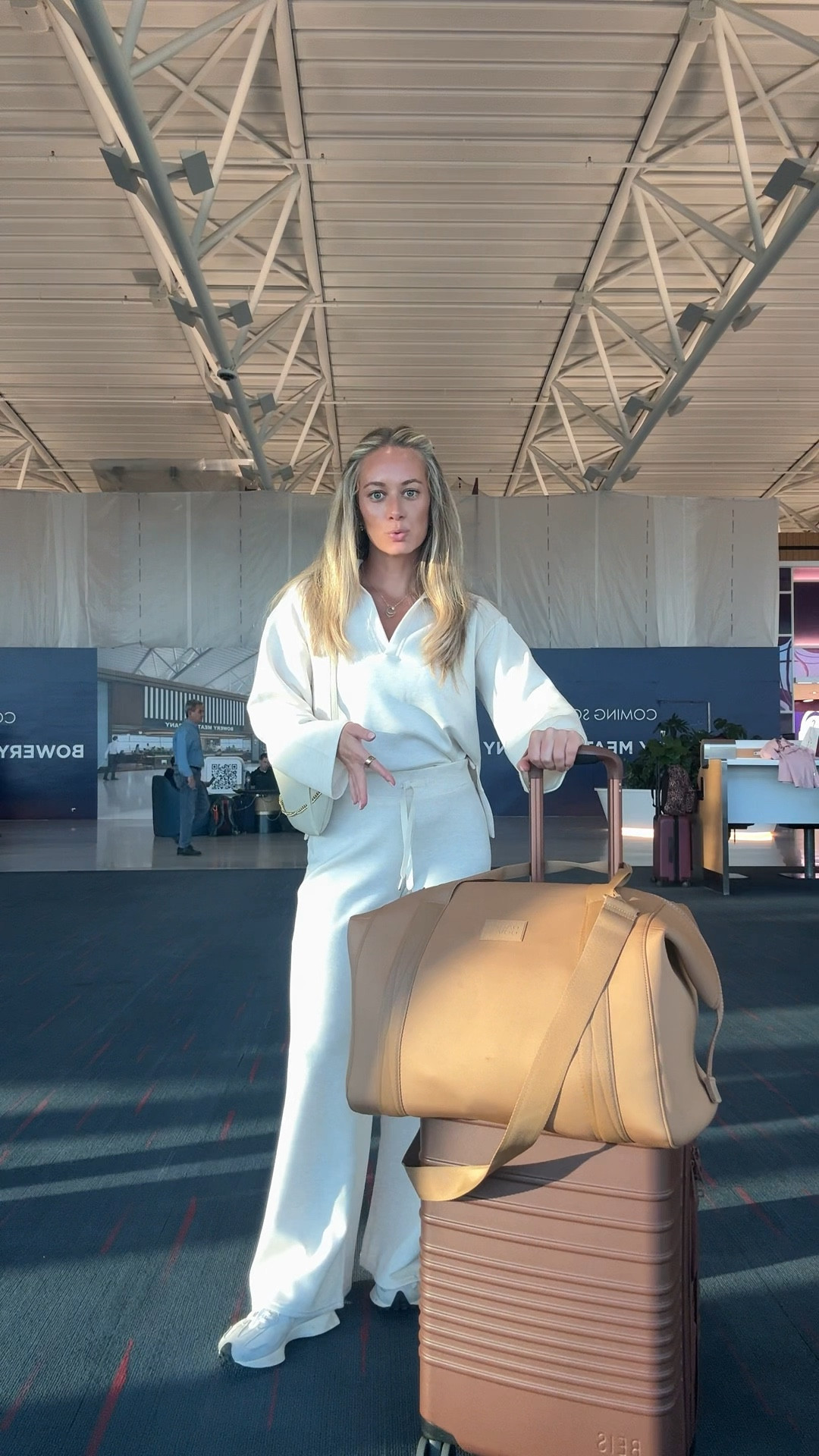 Travel day outfit 🤍 Wearing my @Spanx  Air Essentials set with New Balance 327s for the flight, carrying my @Dagne Dover  carry all and @beistravel  luggage set with the @giginewyork  Beck Sling bag for easy access to everything while traveling.

travel day outfit, airport outfit, airport ootd, travel day style, comfortable travel outfit, spanx air essentials set, airport outfit ideas, travel outfit inspiration, casual airport outfit, travel style outfit

#LTKSpringSale #LTKSaleAlert #LTKTravel