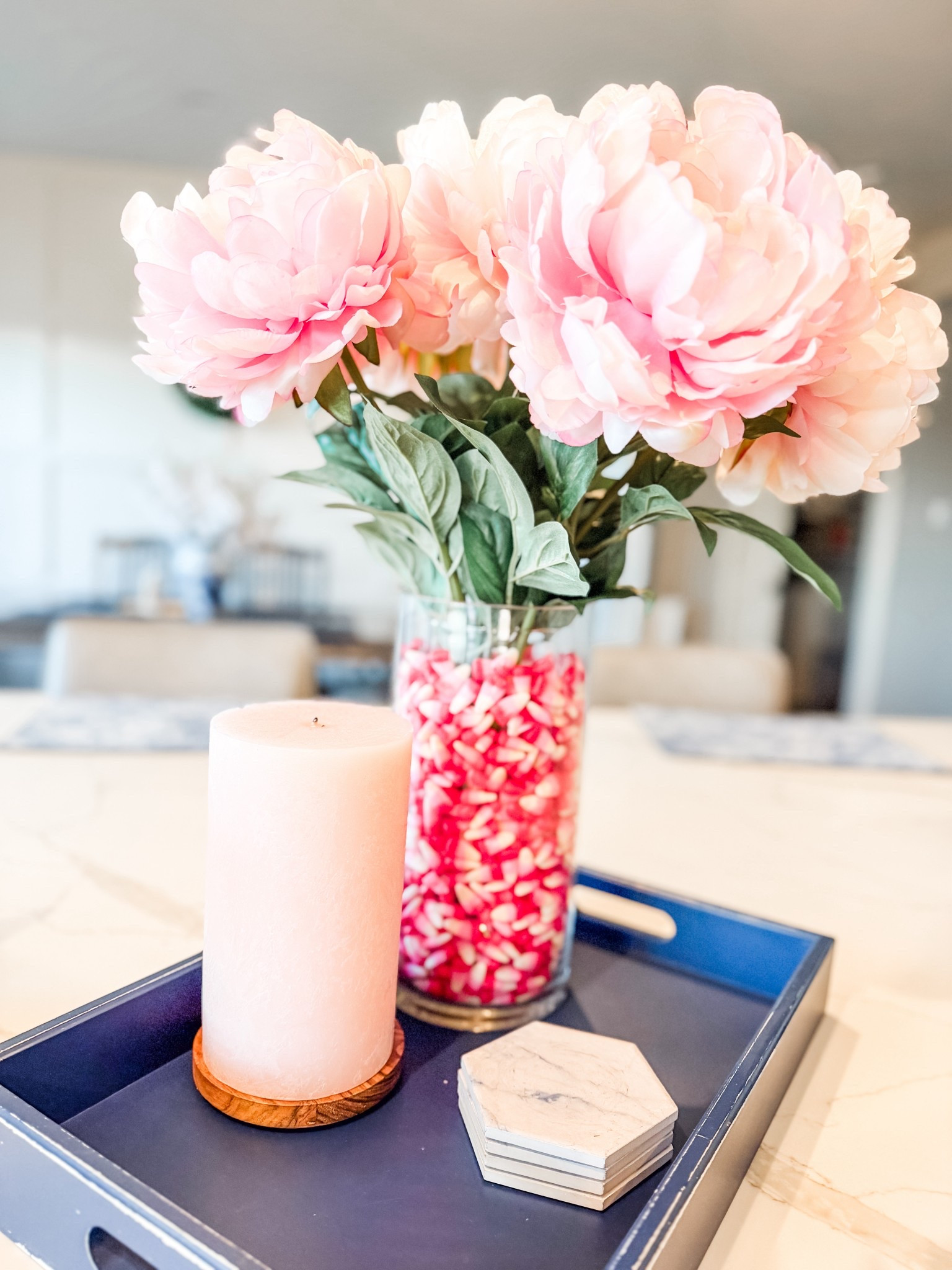 Used Valentine’s Day candy corn and two vases (one skinny inside the larger) to fill the exterior of the vase and make a pretty center piece. 

Valentine’s Day, v day, center piece 

#LTKHome #LTKFindsUnder50