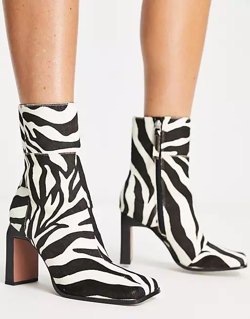 ASOS DESIGN Envy leather high-heeled boots in zebra | ASOS (Global)