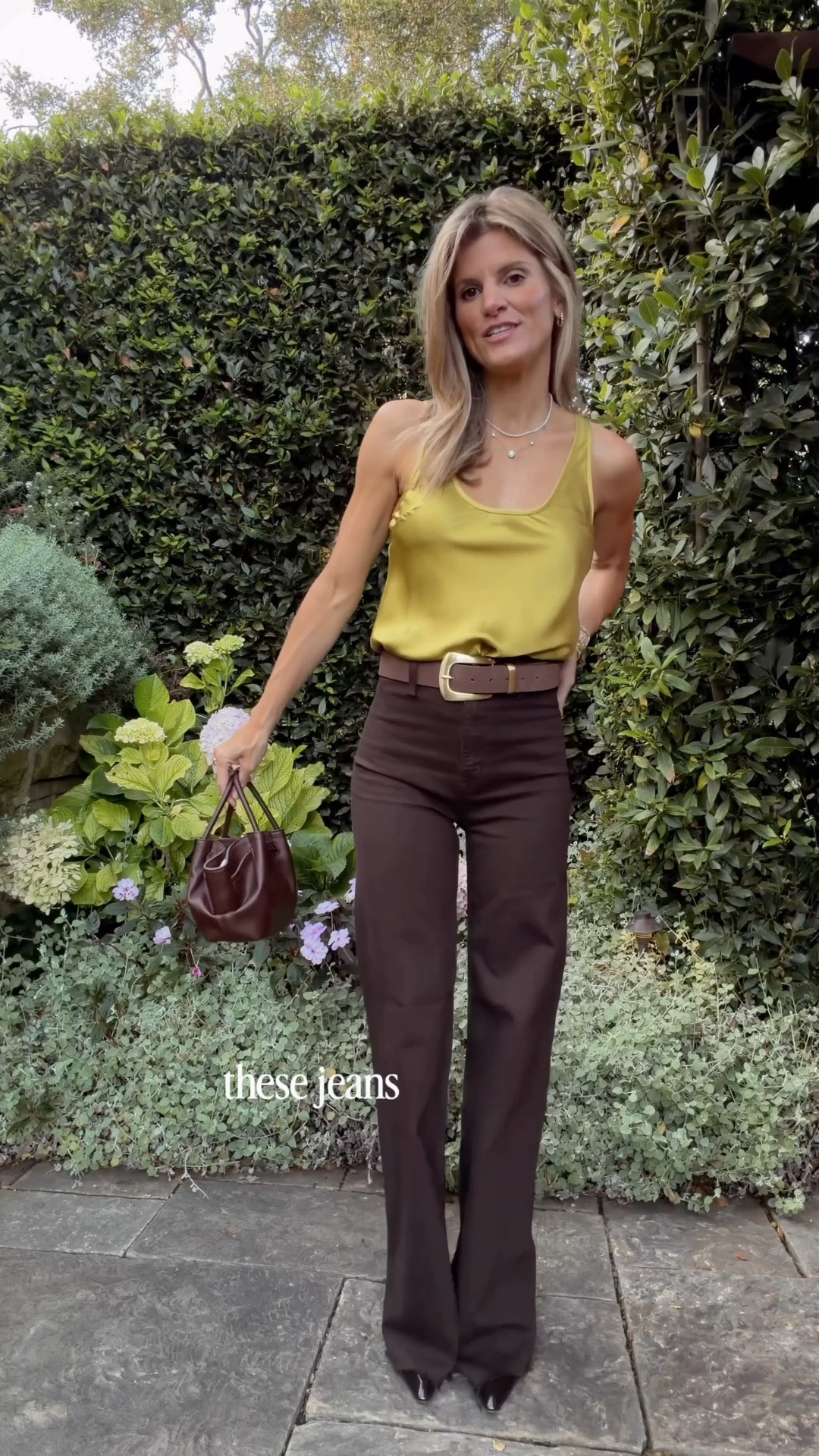 Top - wearing size XS
Jeans - wearing size 23, stretchy, raw hem 
Loving this chartreuse and chocolate brown color combo
