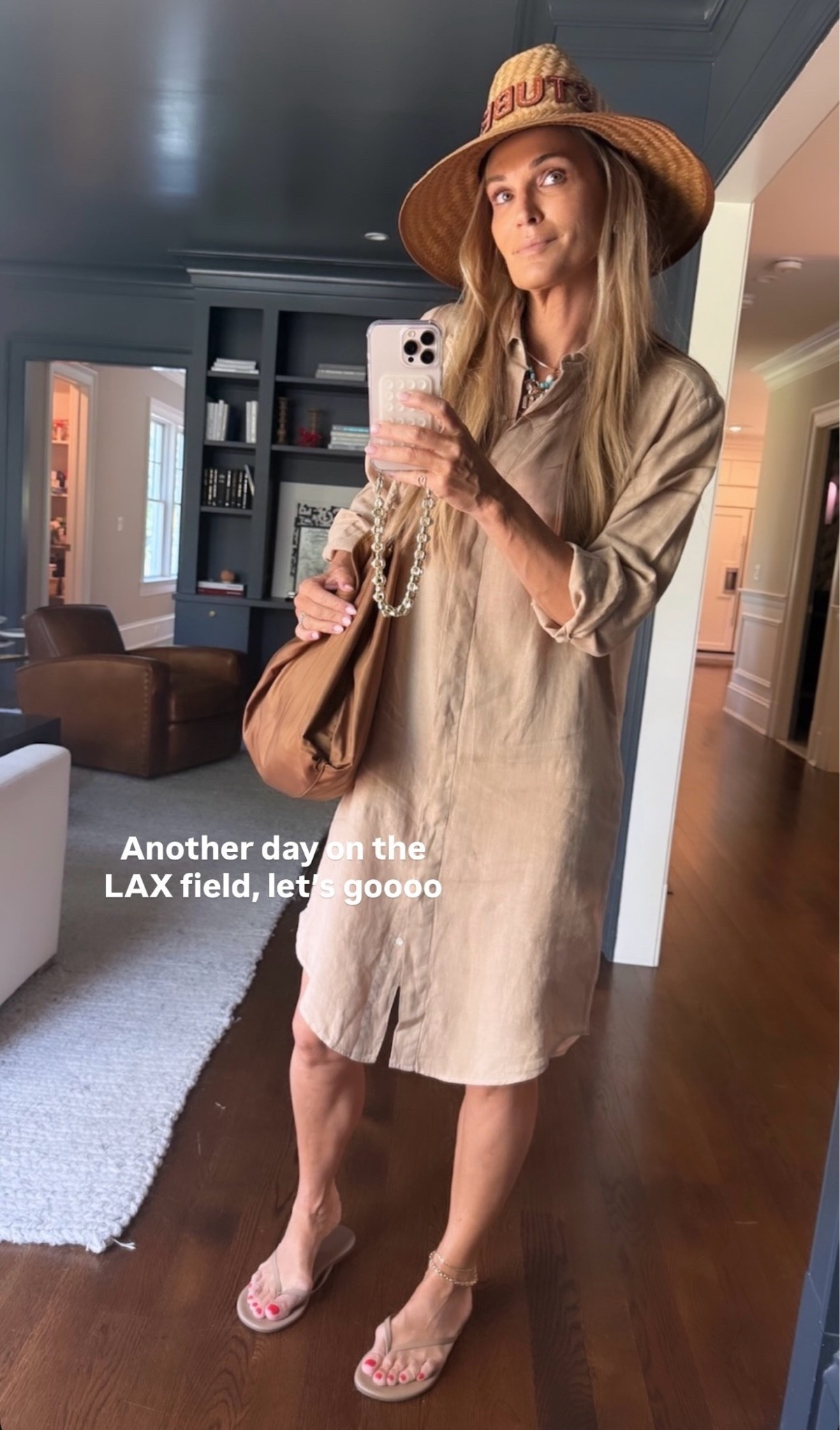 Molly Sims shirt-dress crafted from a luxe heavy linen. Finished with full-length, natural shell buttons, a high-low hem and side-slits at the hem, this midi is ideal for day-trips.