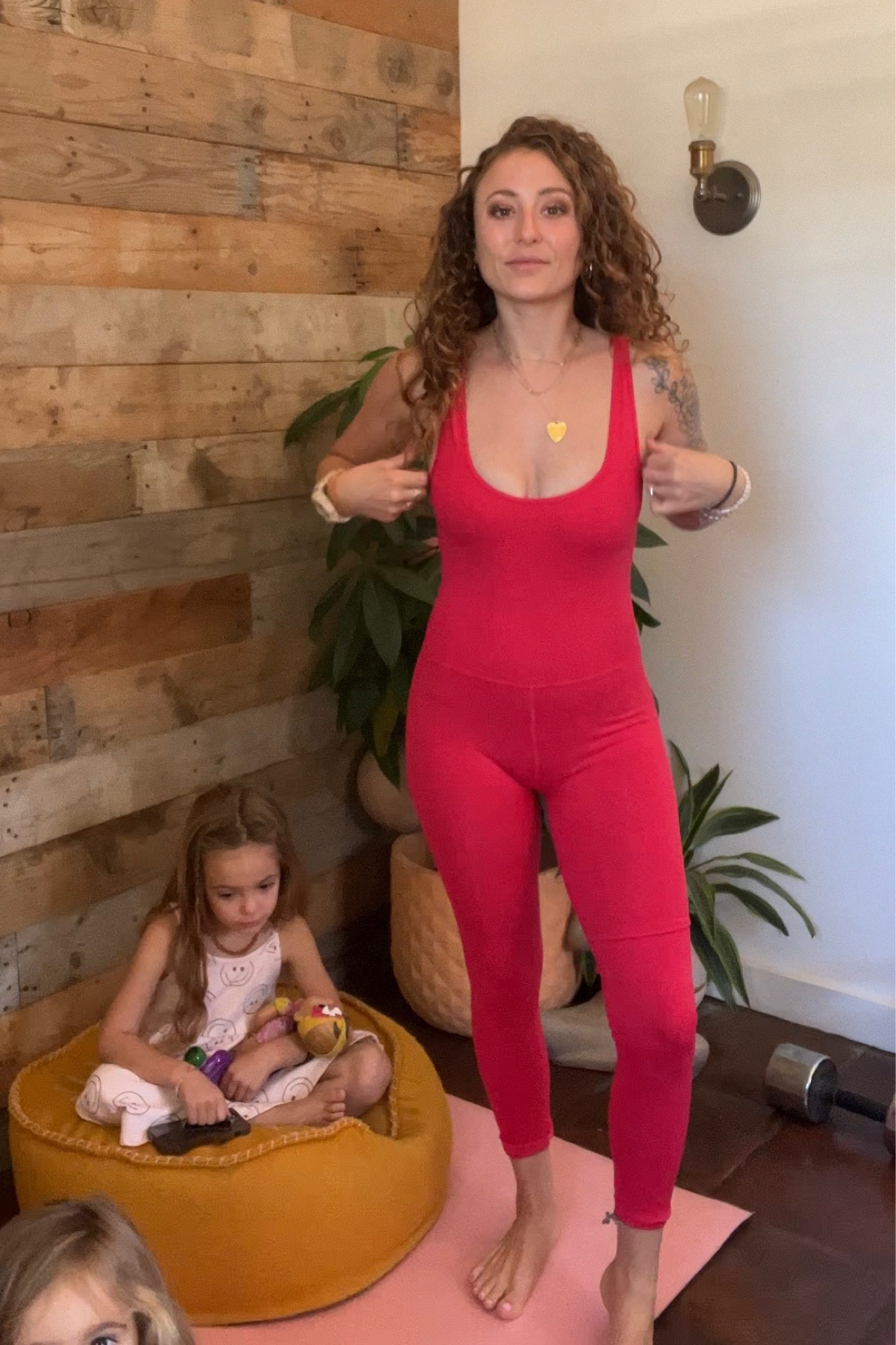 Xs in bright red hood karma onesie 