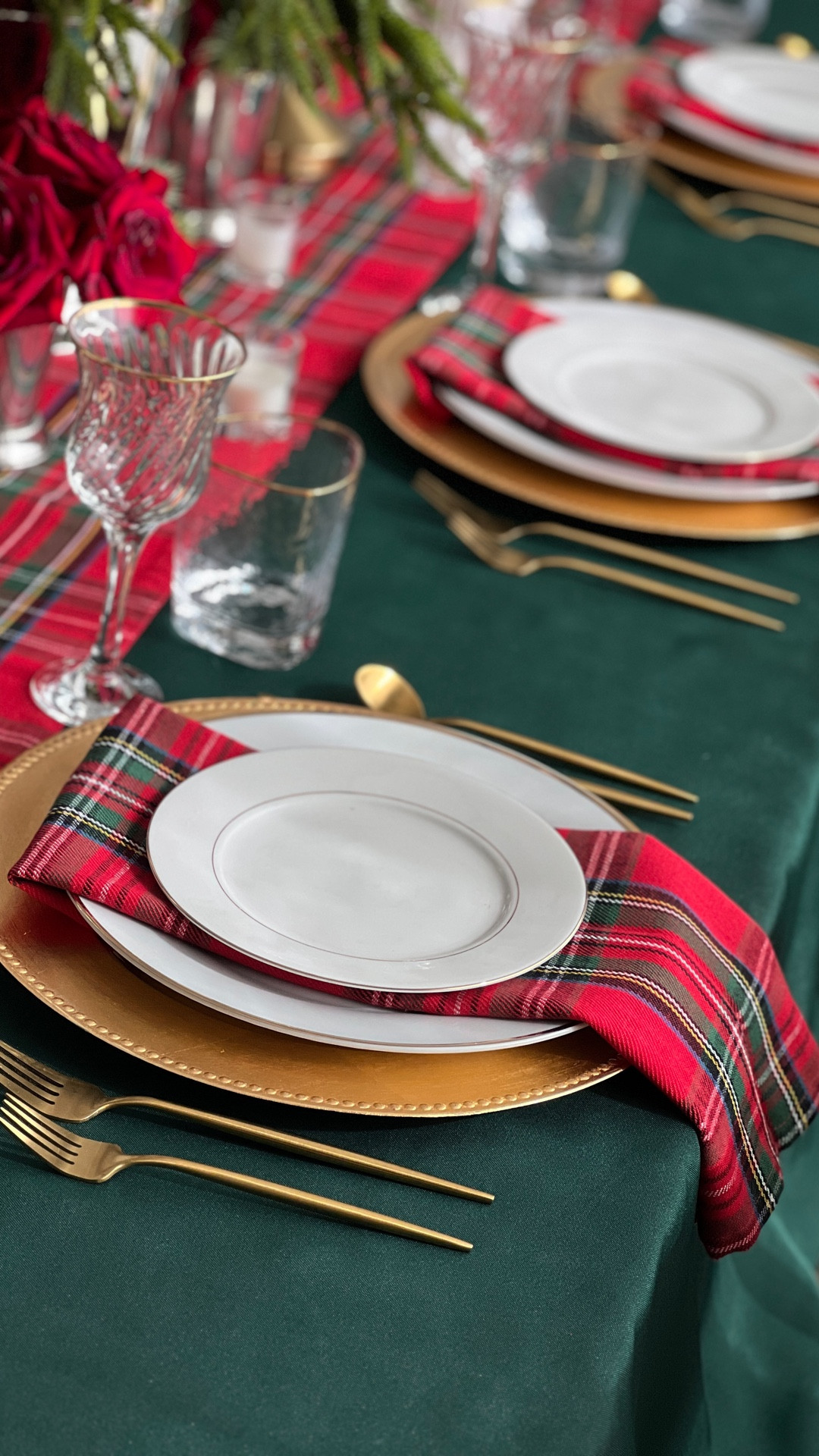 Classic Christmas begins with Ralph Lauren Stewart Tarton plaid! Plaid table runner, plaid napkins, red plaid, classic red tablescape, hunter green tablecloth, gold chargers, gold rimmed China, gold rim glasses, silver ice bucket, silver vase, mint julep cups

#LTKHoliday #LTKSeasonal #LTKHome