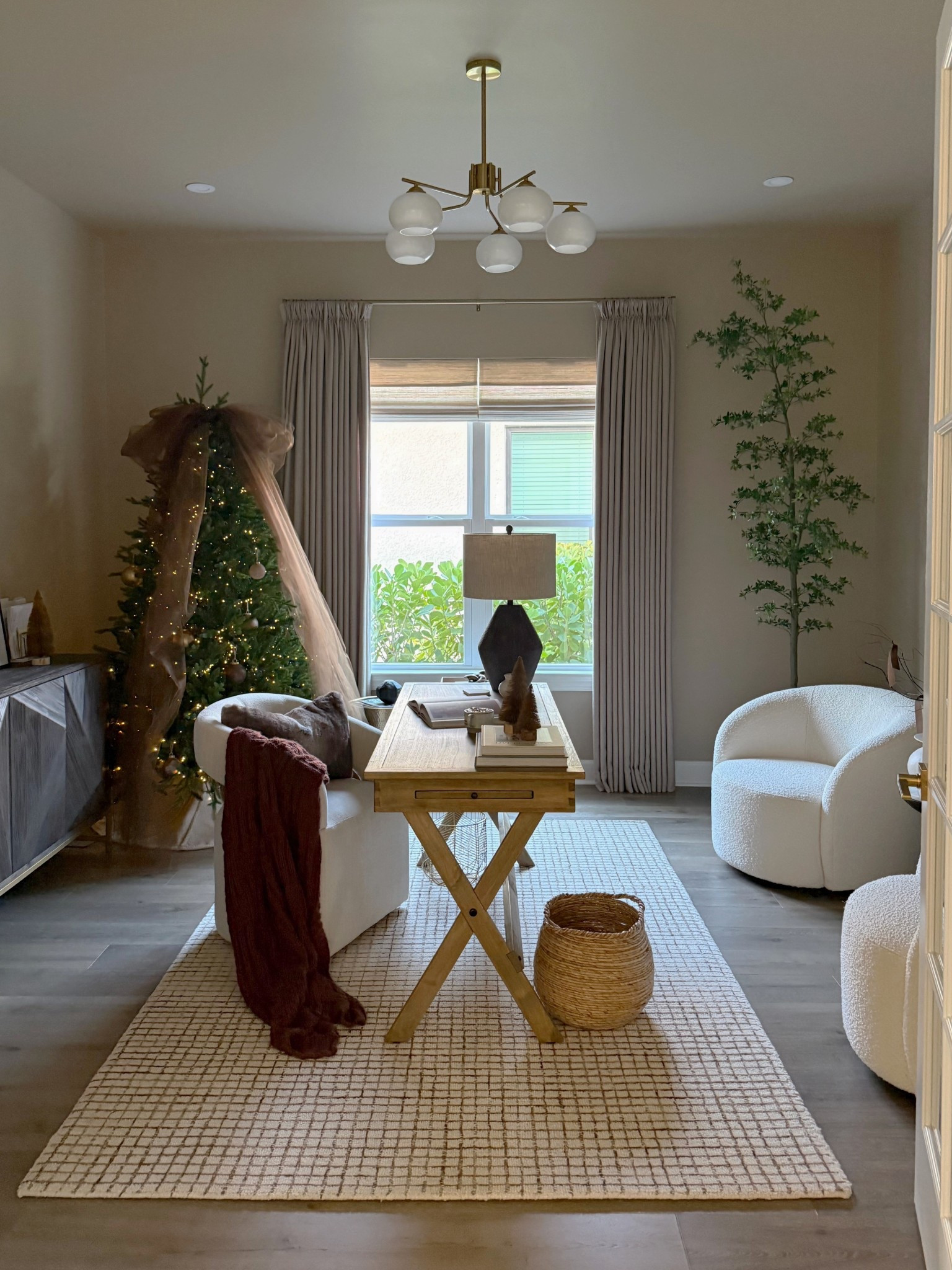 My home office for the Holidays! ✨🤎



Home office, cozy home, office decor, neutral home, office Inspo, Christmas tree, large bow, textured ornaments, accent chairs, office chair, office desk, custom curtains, checkered area rug, shady lady, olive tree, credenza, floor mirror 

#LTKHoliday #LTKHome
