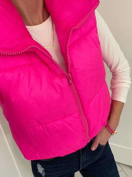Add this neon pink puffer vest to your cart! It’s so cute and I always am getting compliments about it. It comes in multiple other colors, too!

I love this simple white long sleeve. It has a ribbed texture fabric and is fitting to the body. 

These bangles are so fun, but sell out fast and are on MAJOR SALE rn!!

Bell bottom jeans are the funnest! I linked a similar, non-distressed pair below.

Finished off my look with a spritz of my FAVORITE perfume. I’ve been wearing this one for years!! 🥰

Save this post and follow along to shop with me if you liked this style. I cover everything from casual to trendy chic fashion, affordable pieces sprinkled with a few splurges. 🫶🏼

#jenniferxerin #stylewithjen #ltkpetite
Puffer vest. Long sleeve top. Bell bottom jeans. Bracelets. Gold necklace. Casual outfit. Fall fashion. Selfie ootd. Winter outfit. Mom style. Amazon finds. Finds under 100. Affordable fashion. Affordable outfit.

#LTKCyberWeek #LTKSeasonal #LTKfindsunder50