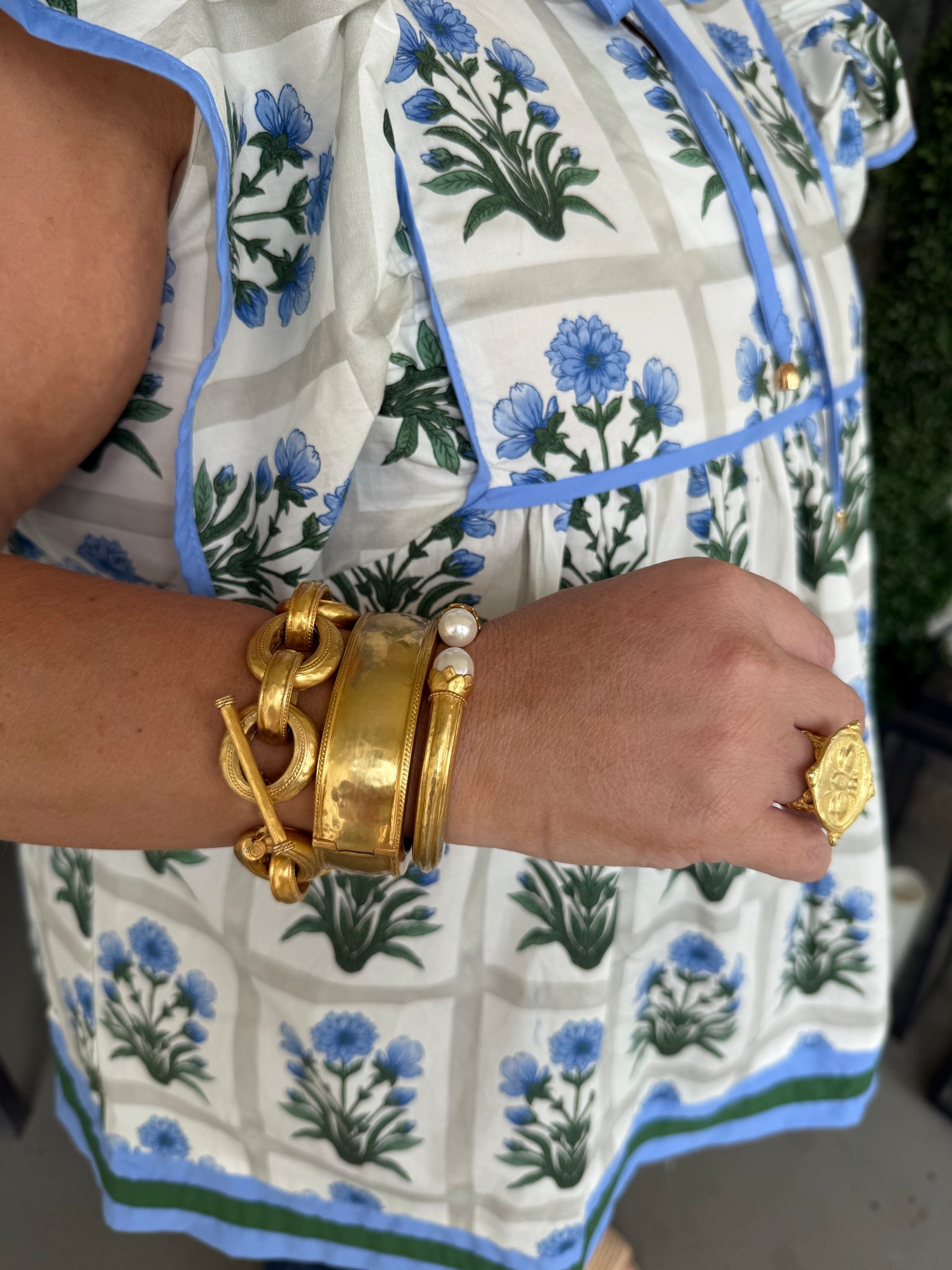 Julie Vos gold bracelets, Susan Shaw ring 