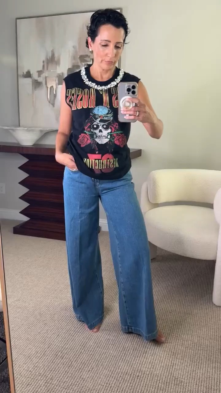 A graphic tee and wide leg denim is such a good combination, but the statement necklace completely changes the look. I love mixing something casual with an unexpected elevated detail.

graphic tee outfit, wide leg jeans, statement necklace, casual fall outfit, denim outfit, band tee outfit, fall denim, everyday style, women’s fall fashion, stylewitheugenia

#LTKSeasonal #LTKOver40 #LTKootd