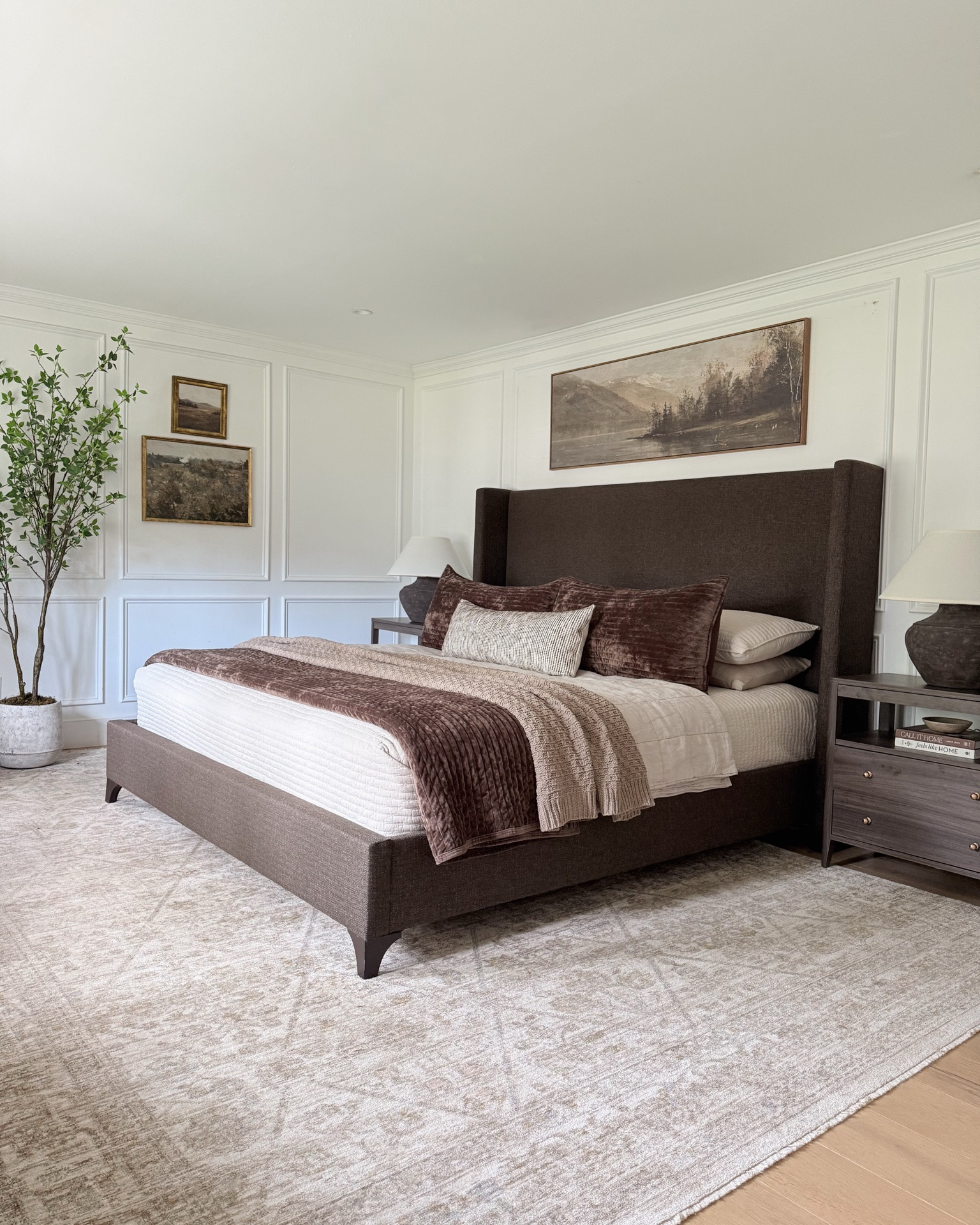 Loving the whole vibe of my bedroom refresh! Soft creams, earthy browns, and cozy texture. 🤎

bed frame | area rug | nigh stand | landscape wall art | lumbar throw pillow | brown quilt | throw | linen quilt | sheets | potted tree | lamp | decor | drapes | shades | curtains | window treatments | curtain rod | books | interior design | lived-in

#LTKHome #LTKSaleAlert #LTKselfcare