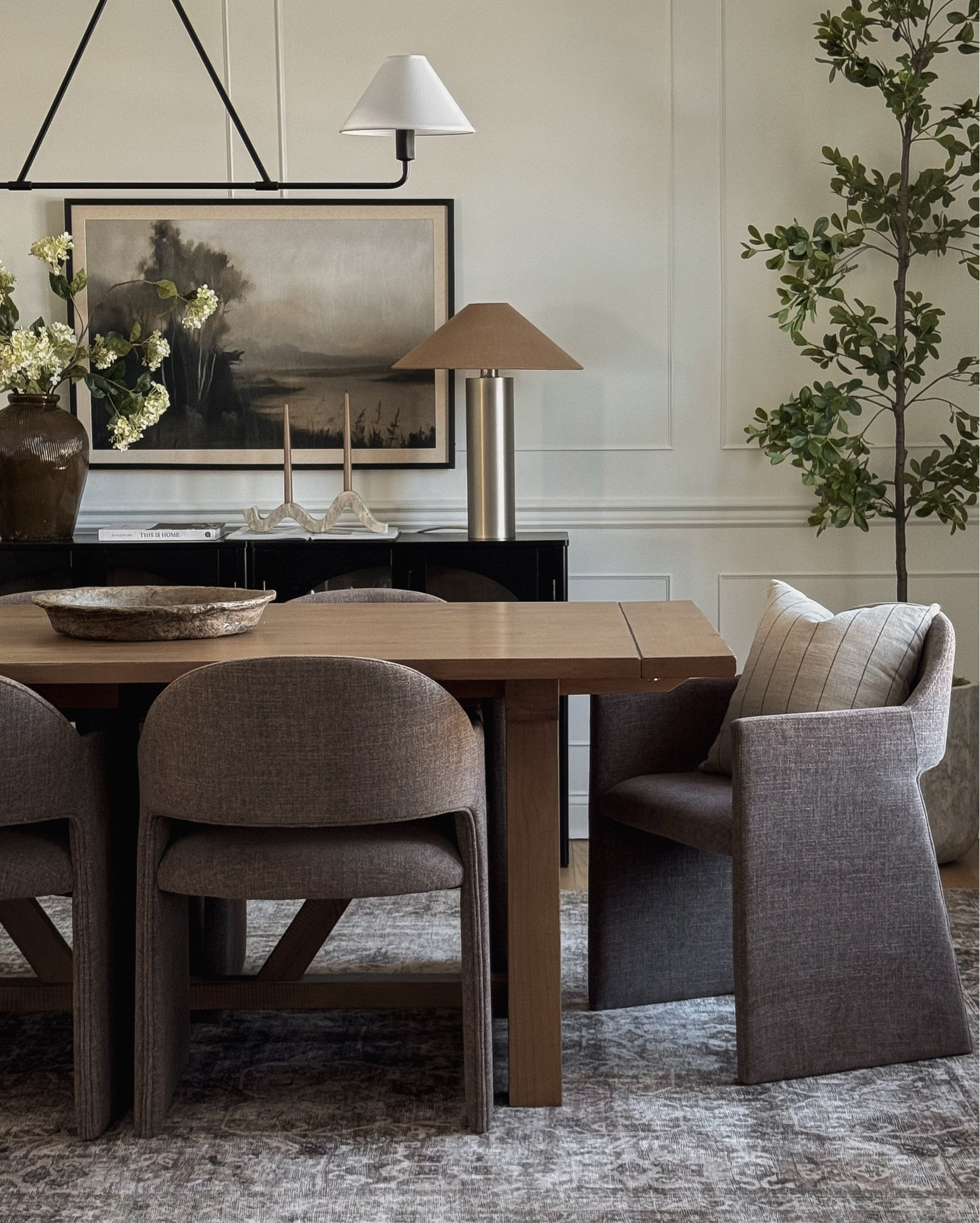 Lamp is from Zara Home. Stems and artwork are from Hobby Lobby. Vase is from Homegoods.

Dining room decor, dining room chairs, dining room table, olive tree, sideboard decor, modern decor, spring decor, sideboard styling, dining room rug ￼

#LTKHome