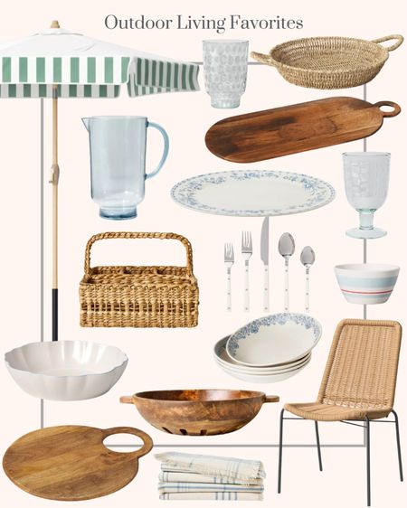 Outdoor living favorites at Target. Melamine striped bowls. White and stainless flatware set. Melamine blue floral platter. Blue plaid napkins. Woven utensils caddy. Blue acrylic beverage pitcher. Melamine mixed pattern bowls. Wooden harvest bowl. Stoneware serving bowl. Large oval serving board. Clear blue tumblers. Round wood serving board. Clear blue goblet. Large woven serving tray. Round valance outdoor patio umbrella. Wicker stackable outdoor patio chairs  

#LTKSeasonal #LTKhome #LTKxTarget