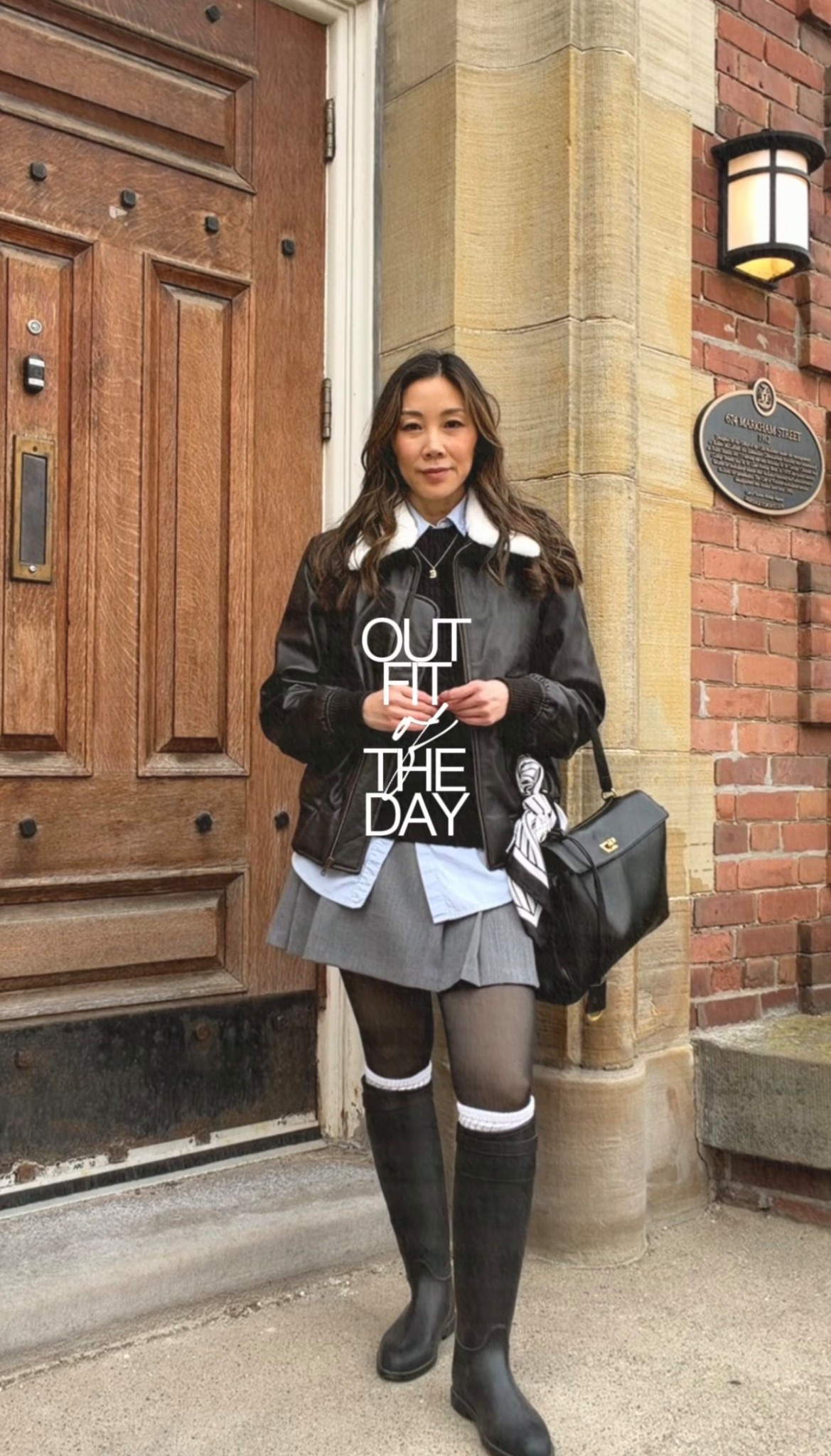 Fall OOTD: leather jacket, pleated skirt, and tall boots — the classic off-duty combo that always looks put-together.