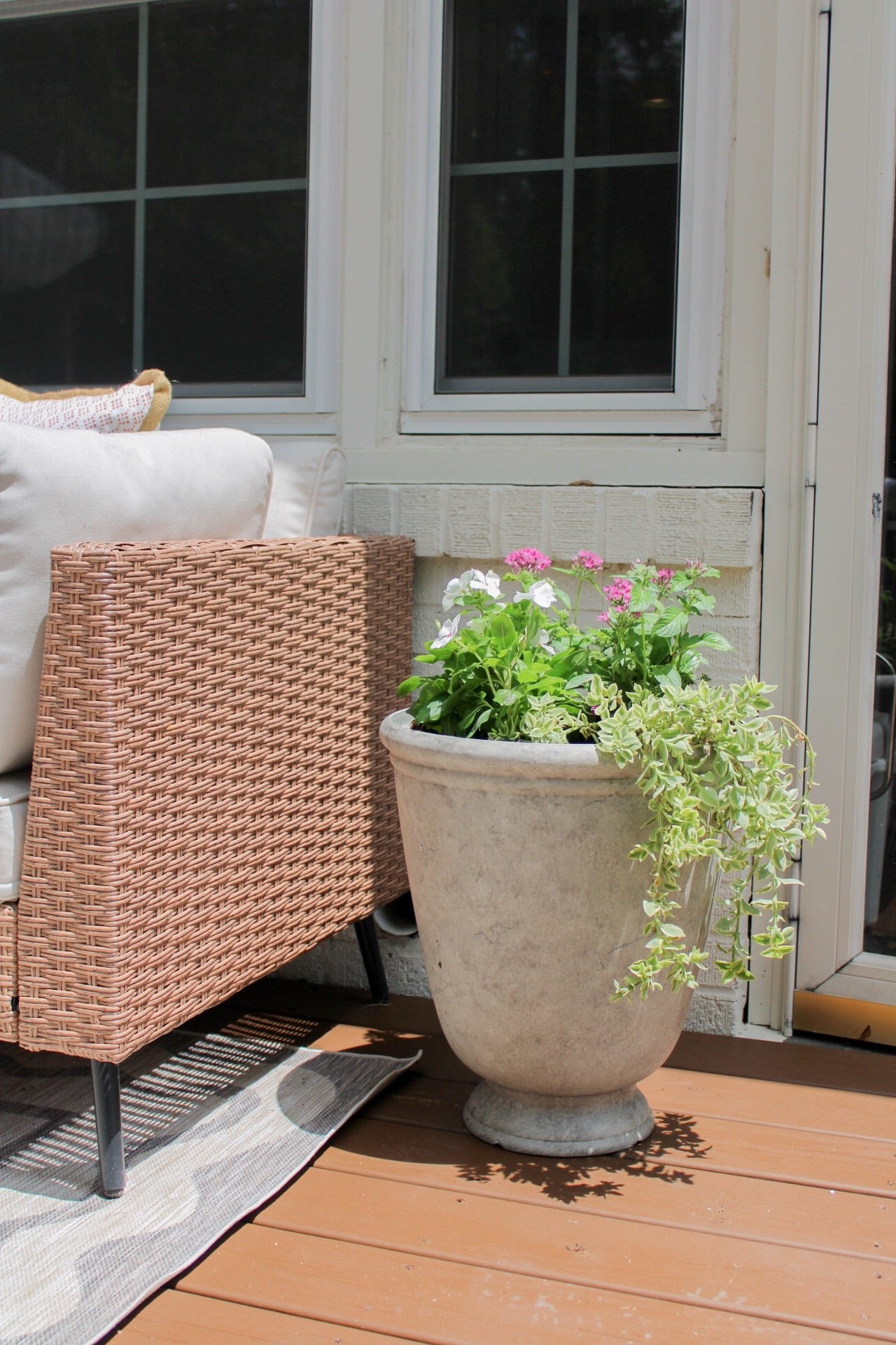 This gorgeous planter is only $23 from Walmart! It ties in the gray colors from our outdoor rugs so well. I also linked the plants I used - all full sun ☀️

#LTKFindsUnder50 #LTKHome #LTKSeasonal