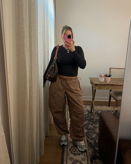 Urban outfitters cargo pants size L. Don’t size up unless you’re really between sizes because they cinch on the sides you can loosen or tighten up. They’re a little baggy but I don’t mind low rise right now! Abercrombie top M. Sneakers tts I’m between a 7.5/8 and wear an 8! 

#LTKshoecrush #LTKfindsunder100