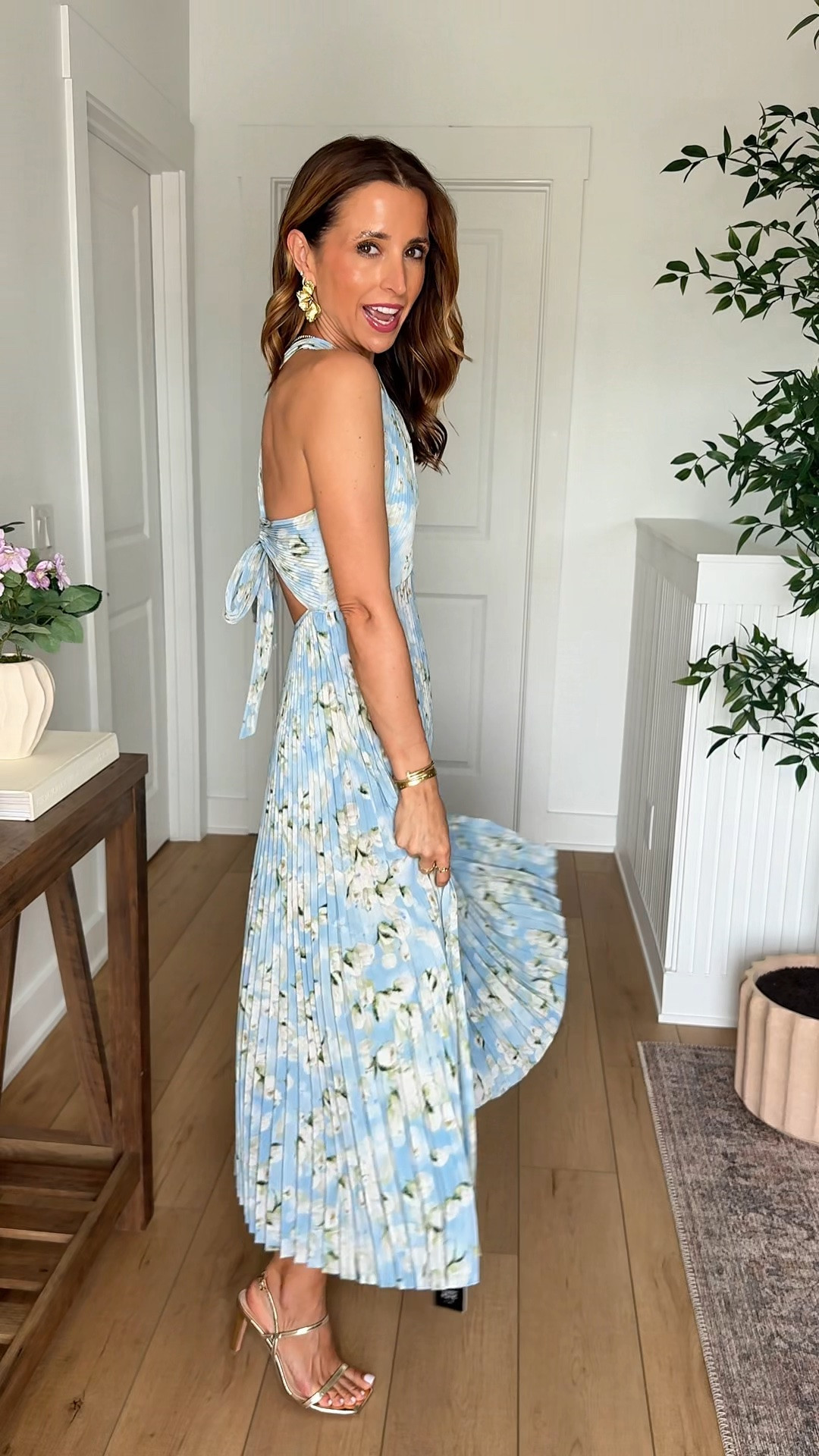 Such a gorgeous wedding guest dress for spring, summer and early fall! Code LISA123 on first time purchases. Wearing XS with adjustable straps. This fits like a dream! Spring wedding guest dress. Summer wedding guest dress. Baby shower dress. Wedding shower dress. Wedding guest dress. Pleated midi dress. Cocktail dress. Party dress.

#LTKootd #LTKWedding #LTKTravel