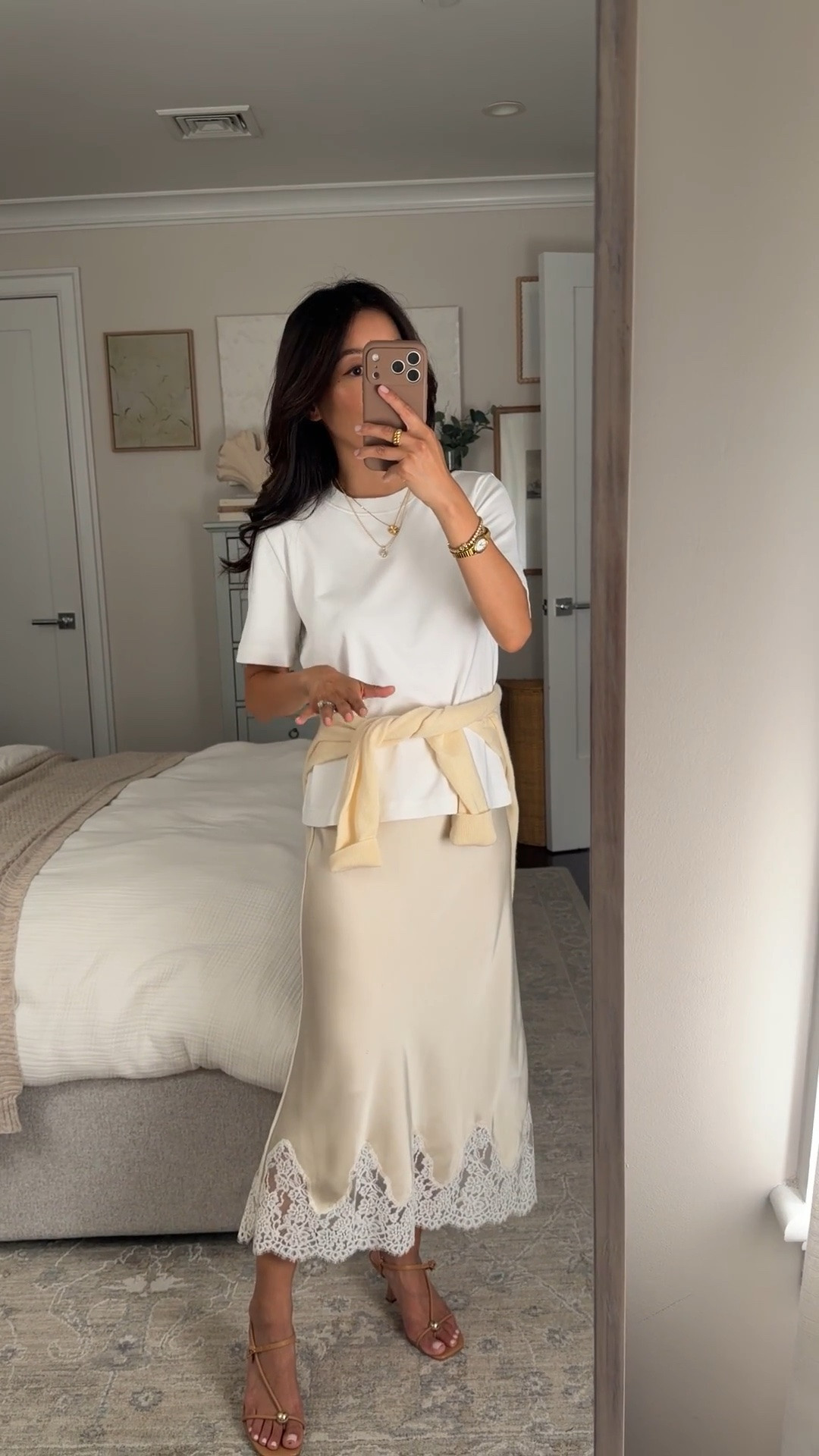 Size info below! • Satin skirt XS in Seaside Cream, I sized up 
• Cotton tee XS, sized up for looser fit 
• Quince cashmere sweater XS 
• Loeffler Randall sandals 5.5 

summer date night outfit ideas, girls dinner, satin midi skirt, petite style

#LTKPetite #LTKSeasonal #LTKootd