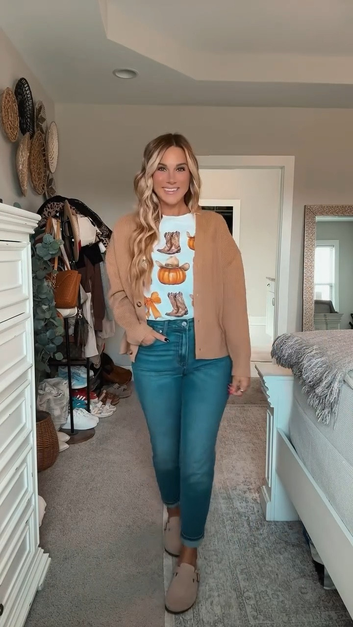 Take me to a pumpkin patch! Obsessed with these jeans, a cozy fall graphic tee, and my fave button-down cardigan. Ready for all the autumn fun—who's with me? 🍂🎃
I am 5’6 147lbs wearing a size medium jeans (rolled the bottoms) size medium t-shirt, size small cardigan, shoes fit true to size.

#LTKSeasonal #LTKHalloween #LTKStyleTip