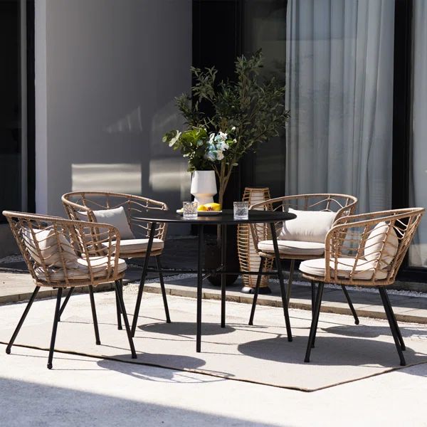 Benhurst 4 - Person Round Outdoor Dining Set with Cushions | Wayfair North America