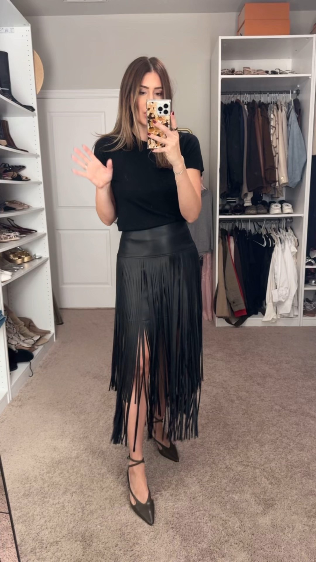 Small in tee, size 4 in skirt 