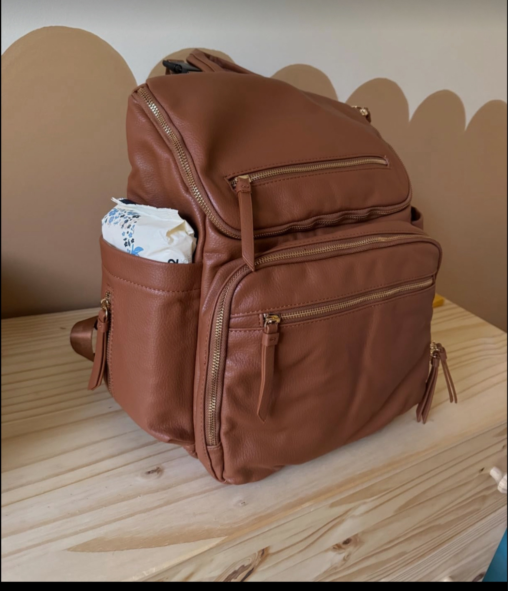 Brown leather diaper bag 

#LTKBaby #LTKKids #LTKFamily