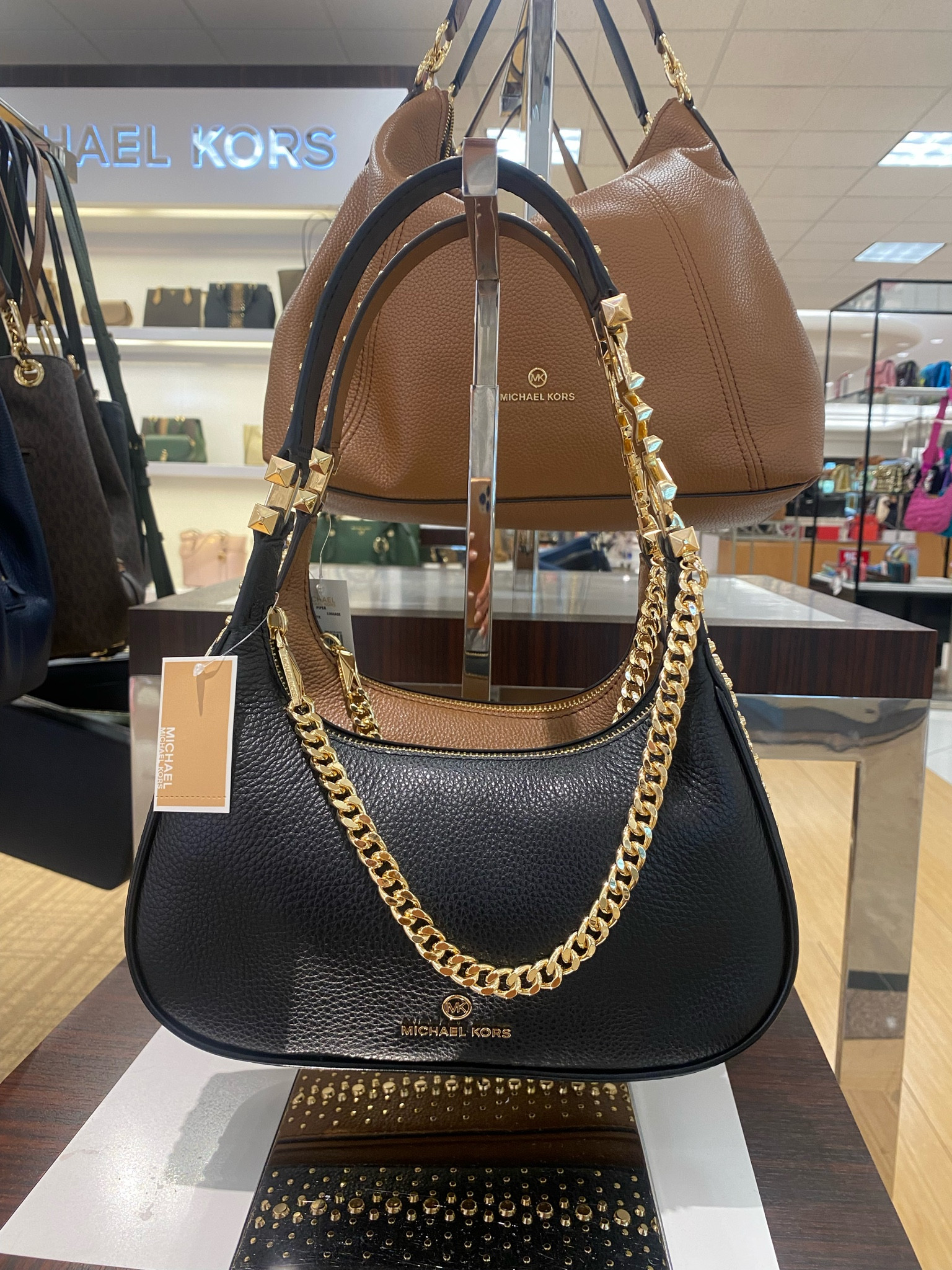 Not usually my choice brand but the cutest black shoulder bag for going out! Love the gold chain. Decently low price for designer. Good job with this trendy bag Michael Kors 👏🏼 

Would be a great gift 

#LTKHoliday #LTKSale #LTKGiftGuide
