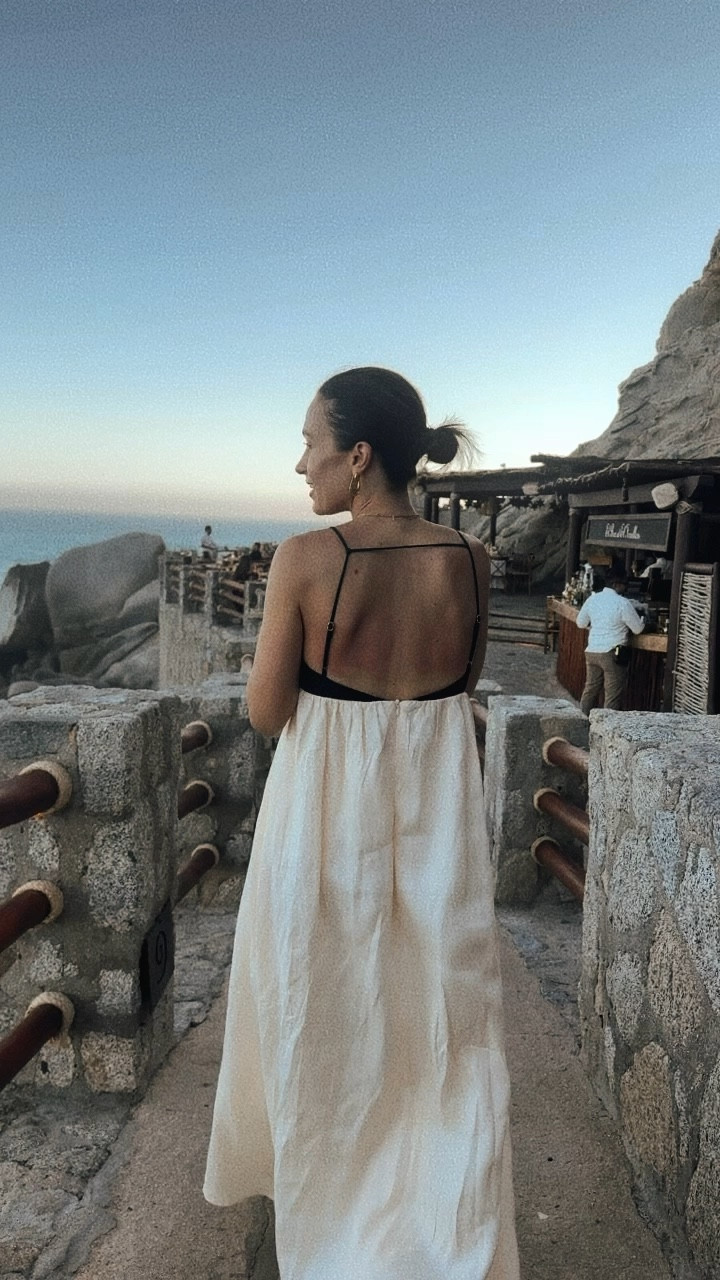 The back of last night’s linen dress 
So comfortable, with pockets, lined, and short gal friendly 
Wearing a size 2 

#LTKOver40