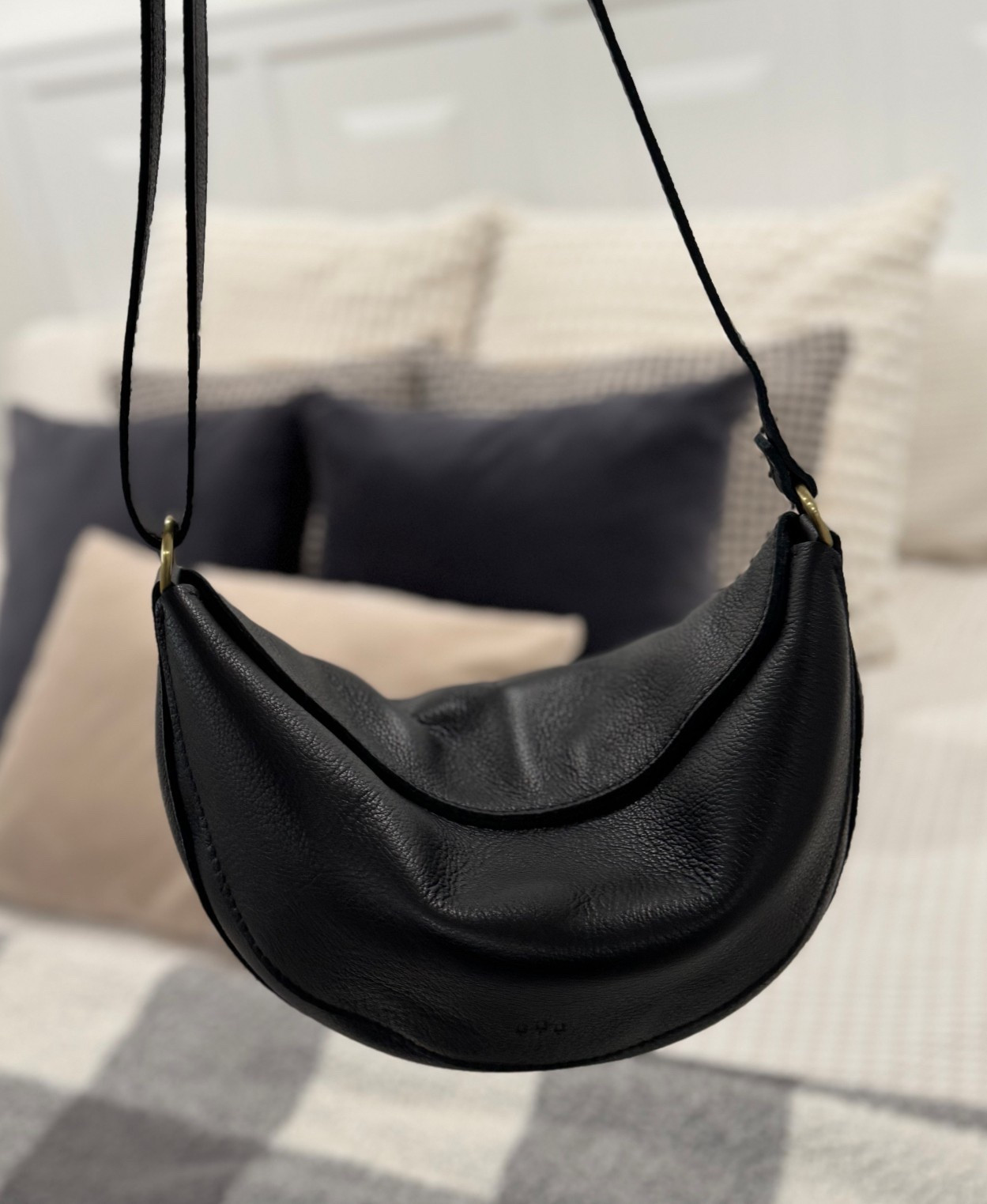 I loved my mini crossbody tote so much I bought another Portland Leather Goods bag. This one is the Large Koala in pebble black leather. It’s not as big as I expected, I was worried it was going to be way too big. The strap extends allowing for a great crossbody option, I’m 5’4 and it’s right at my hip. 

The magnetic closure is fantastic. And my favorite part is it gets a little slouchy. 

My kids are a little older but if I had baked diapers, wipes and snacks would fit in here with a bit of room to spare! 

There’s currently a code running to save 25% making this full grain leather bag less than $100, I also got a free wallet with it!
 

#LTKmomlife #LTKgrwm #LTKFindsUnder100