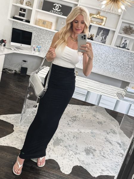 FOUND >>> The perfect summer outfit and both pieces are UNDER $70!This cropped white tank is such a versatile staple that can be worn so many different ways. And how slimming is this high waisted maxi skirt. It’s under $70 and comes in white too. Both pieces run tts, I’m wearing an XS in the skirt and tank. 

#LTKover40 #LTKfindsunder50 

#LTKSeasonal