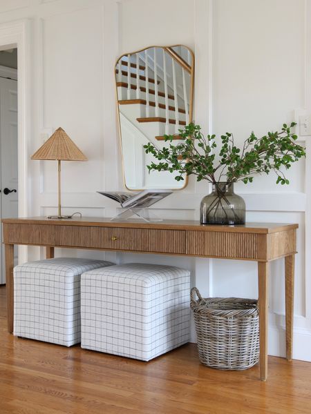 A current view of this space. I love this textured white oak console table from McGee and Co. The rattan table lamp, metal curved mirror, and upholstered cubes are from Target Studio McGee. The rattan round planter and acrylic book holder are from Amazon 

#LTKstyletip #LTKFind #LTKhome