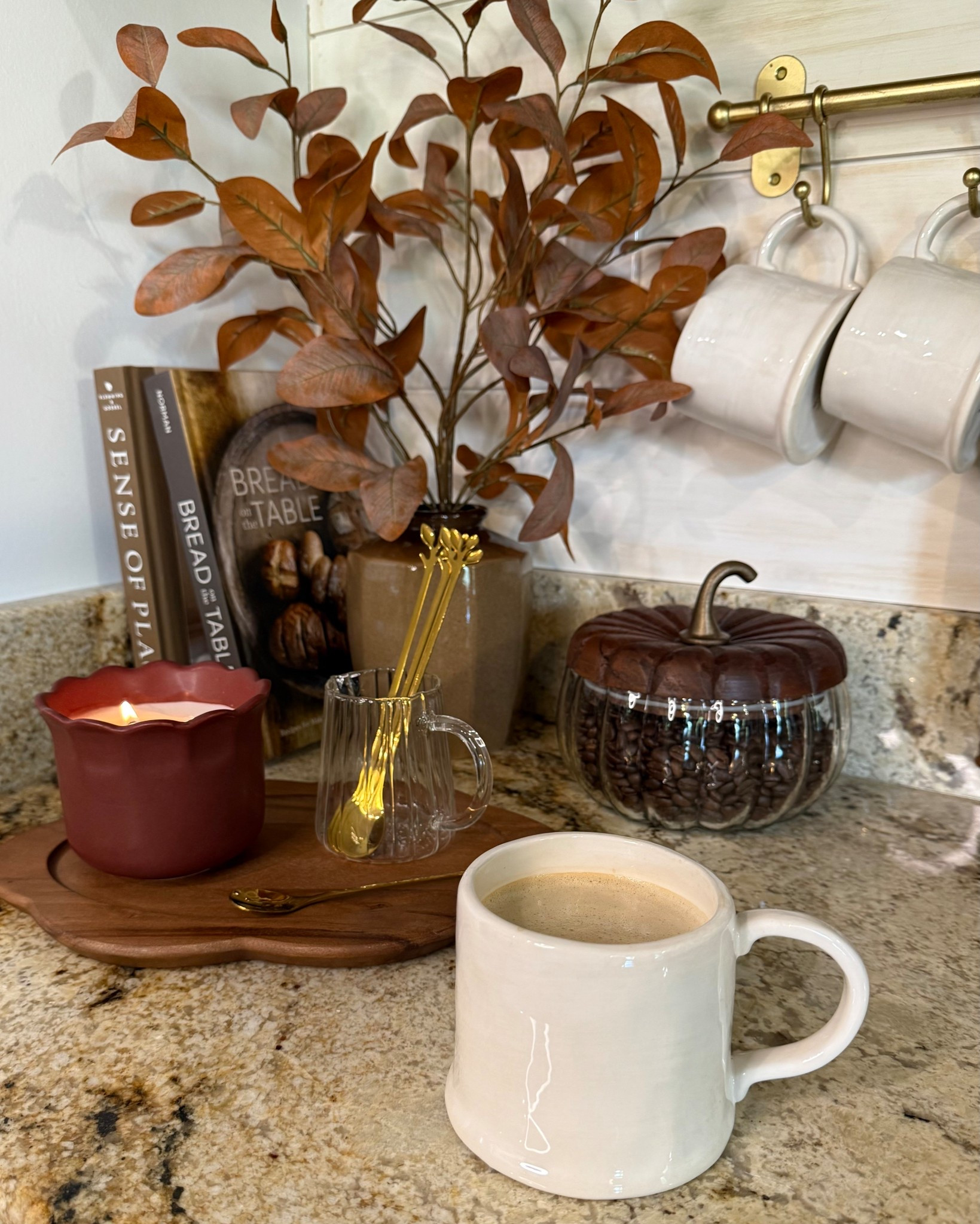 Styled for Fall, Brewed for You ☕🍂
Follow @farmtotablecreations on Instagram for more home styling inspo.

This coffee bar corner got a cozy fall upgrade with warm earthy tones, gold accents, and textural details. From the faux stems to the pumpkin jar, every piece blends function with seasonal charm — making that first sip in the morning feel extra special.

#coffeebar #fallcoffeebar #fallkitchen #kitchendecor #kitchencorner #mugs #fauxstems #fallstyling #coffeecorner #coffeestation #pumpkincanister #ltkautumn



#LTKHome #LTKSaleAlert #LTKFindsUnder50