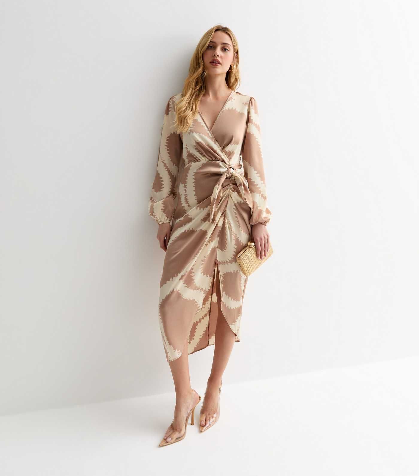 Camel Abstract Print Long Sleeve Wrap Midi Dress
						
						Add to Saved Items
						Remove fro... | New Look (UK)