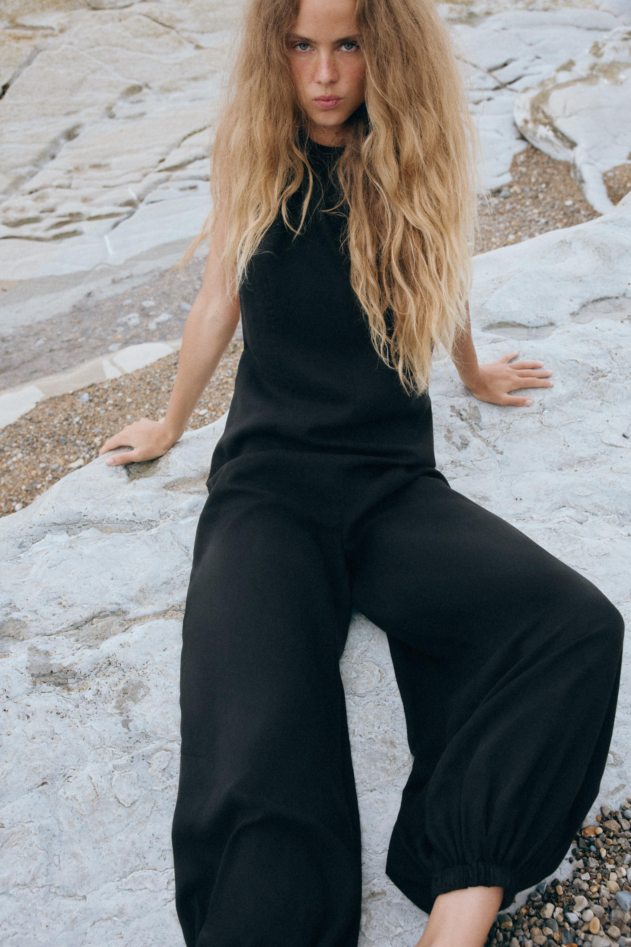 Jumpsuit with main fabric made of 100% lyocell. Halter neckline and sleeveless. Elastic cuffs at ... | Zara US
