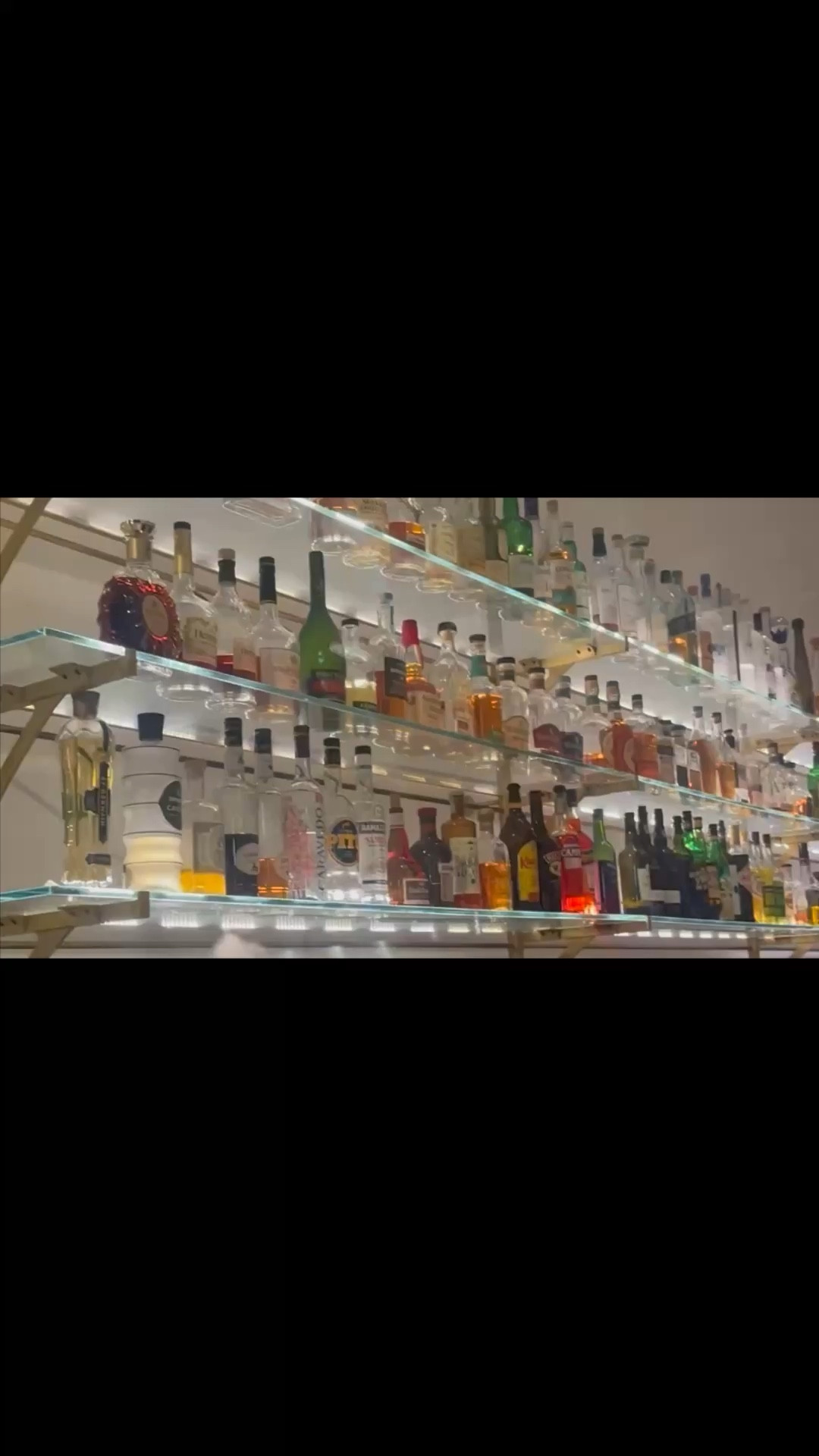 A moment in brass and glass 🤍

There’s something undeniably striking about a wall- or ceiling-mounted wine rack — it turns storage into a true design feature. Suspended, sculptural, and intentional, it draws the eye upward and instantly elevates the entire space.

The brass detailing adds that warm, refined glow — not overly polished, just enough to catch the light and bring a sense of quiet luxury. Paired with glass bottles, it becomes almost like an installation… layered, reflective, and beautifully composed.

It’s not just about storing wine — it’s about how you display it. Thoughtful, elevated, and designed to be seen.

⸻

#winerack #barinspo #homebar #barstyling #interiordesign #interiorinspo #brassdetails #modernchic #homedecor #designinspiration #elevatedinteriors #luxuryliving #glassandbrass #statementdesign #homebarinspo #wallmounted #ceilingmounted #designmoment

#LTKHome #LTKFestival