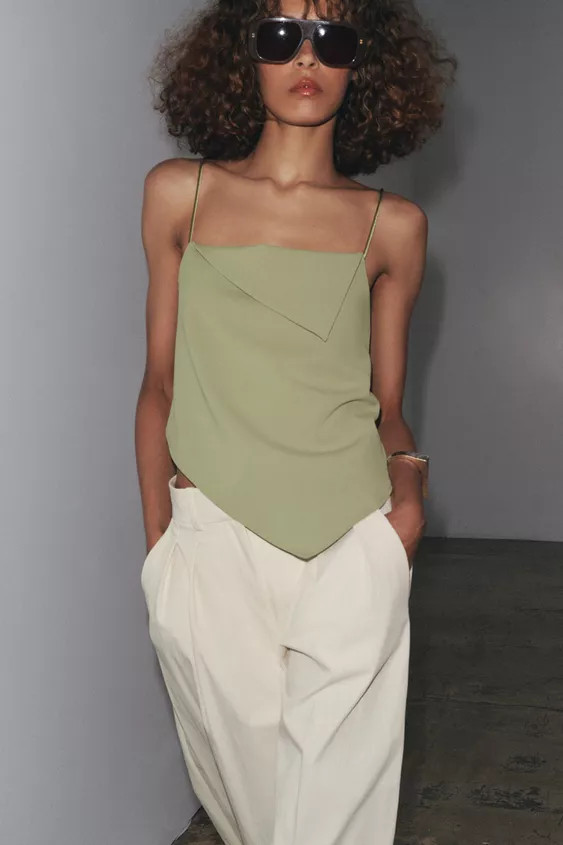 Top with a straight neckline and thin straps. Asymmetric hem with pointed detail. | Zara US
