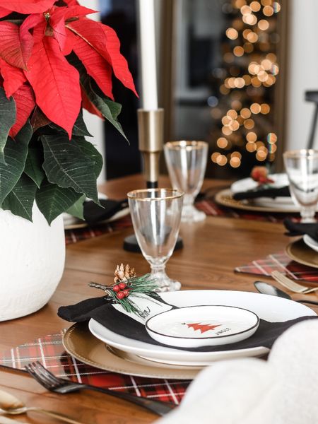 Christmas dining room sources! Christmas table ideas: Plaid placemats, gold chargers, white dinner, plates, black cloth, napkins, and Poinsettia centerpiece!

#LTKHoliday #LTKhome #LTKunder50