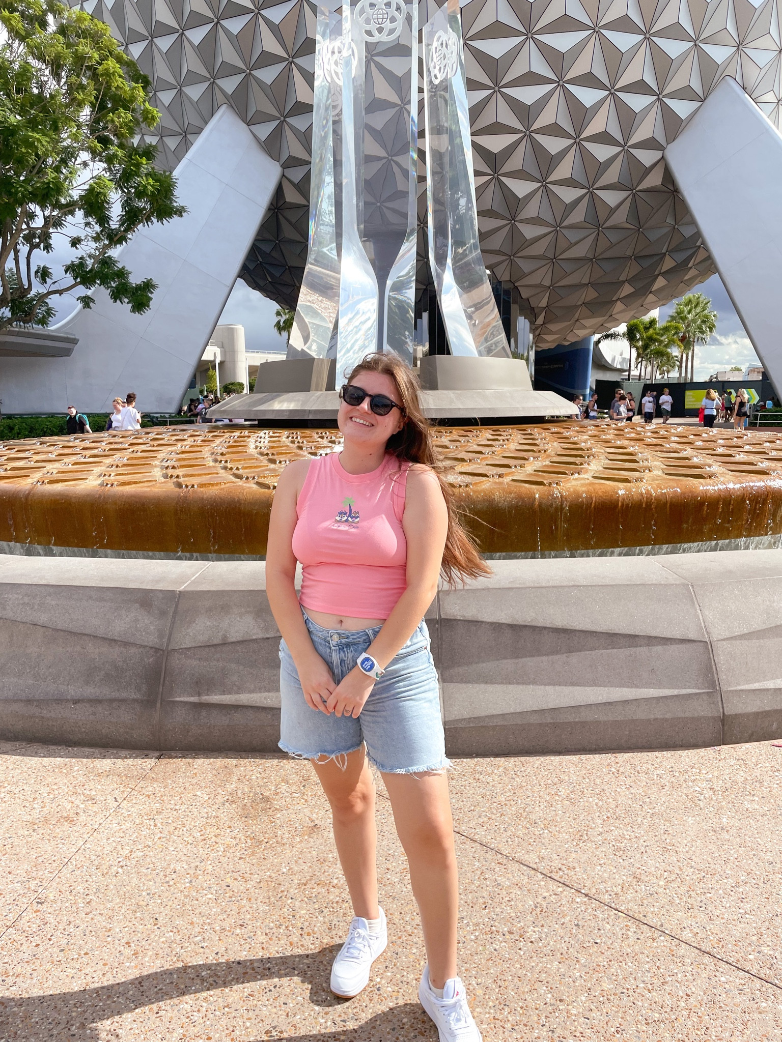 Summer Days at Disney’s Epcot! My go to Disney outfit is always a cropped tank and longer inseam shorts with comfortable sneakers. It’s the perfect outfit to keep you cool in the summer Florida heat and comfortable while walking around the Disney parks. 
#epcot #disneystyle #disneyoutfit #epcotoutfit #disneyvacation #disneyworld 

#LTKunder50 #LTKtravel #LTKSeasonal