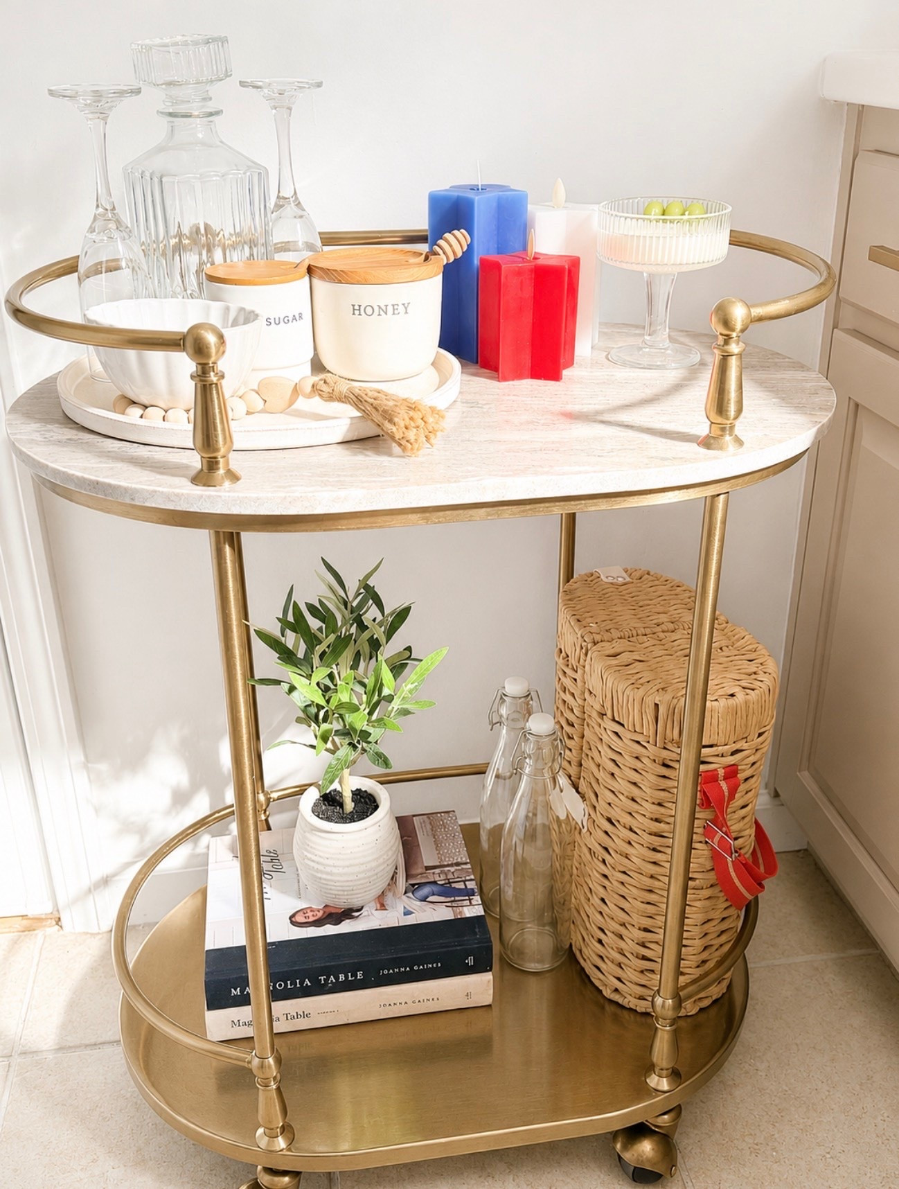 A little styling goes a long way. ✨🤍 This Hearth & Hand bar cart adds the perfect touch of warmth and charm to my kitchen corner. From hosting essentials to everyday décor, it’s one of my favorite pieces in our home.

#HearthAndHand #TargetHome #BarCartStyling #NeutralHomeDecor #CozyHome #HomeInspiration
