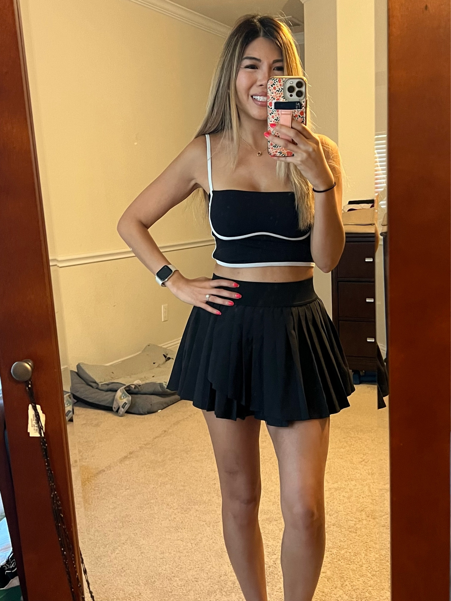 Alo top in small - but I’ll link the Amazon dupe 

skirt in small  